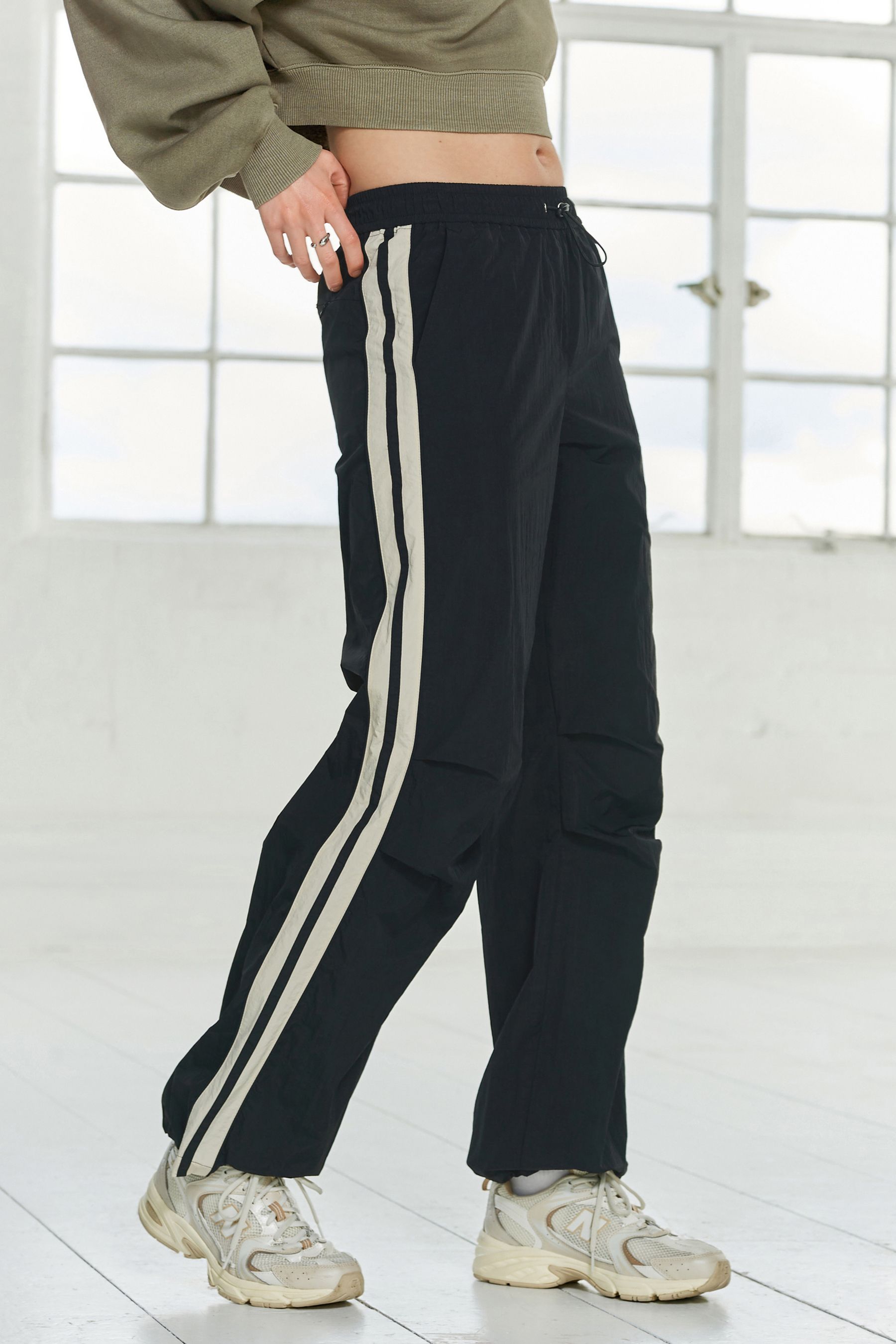 Track joggers with side stripe clearance