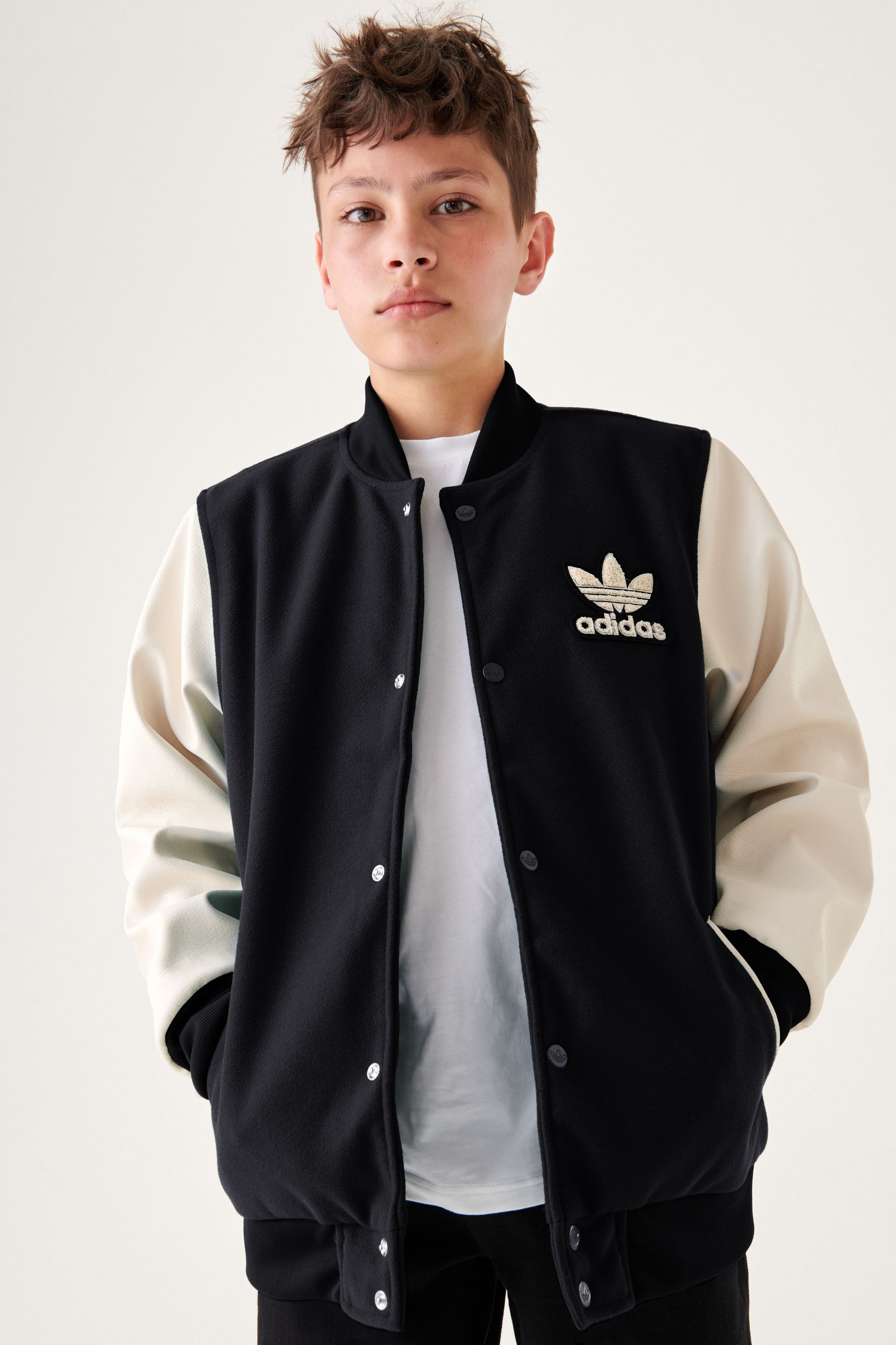 Buy adidas Originals Junior Varsity Black White Jacket from Next Lithuania