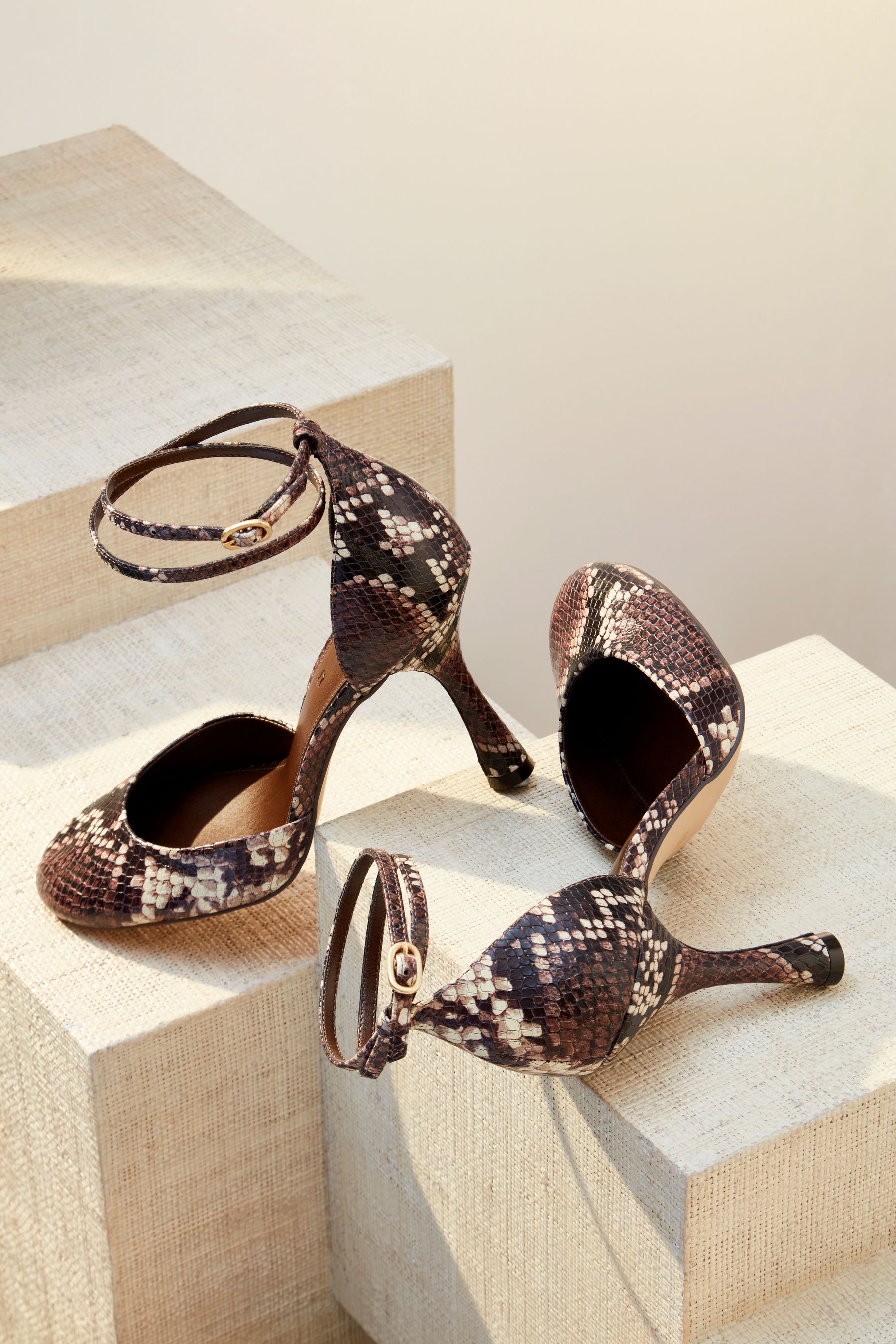 Snake heel shoes sales