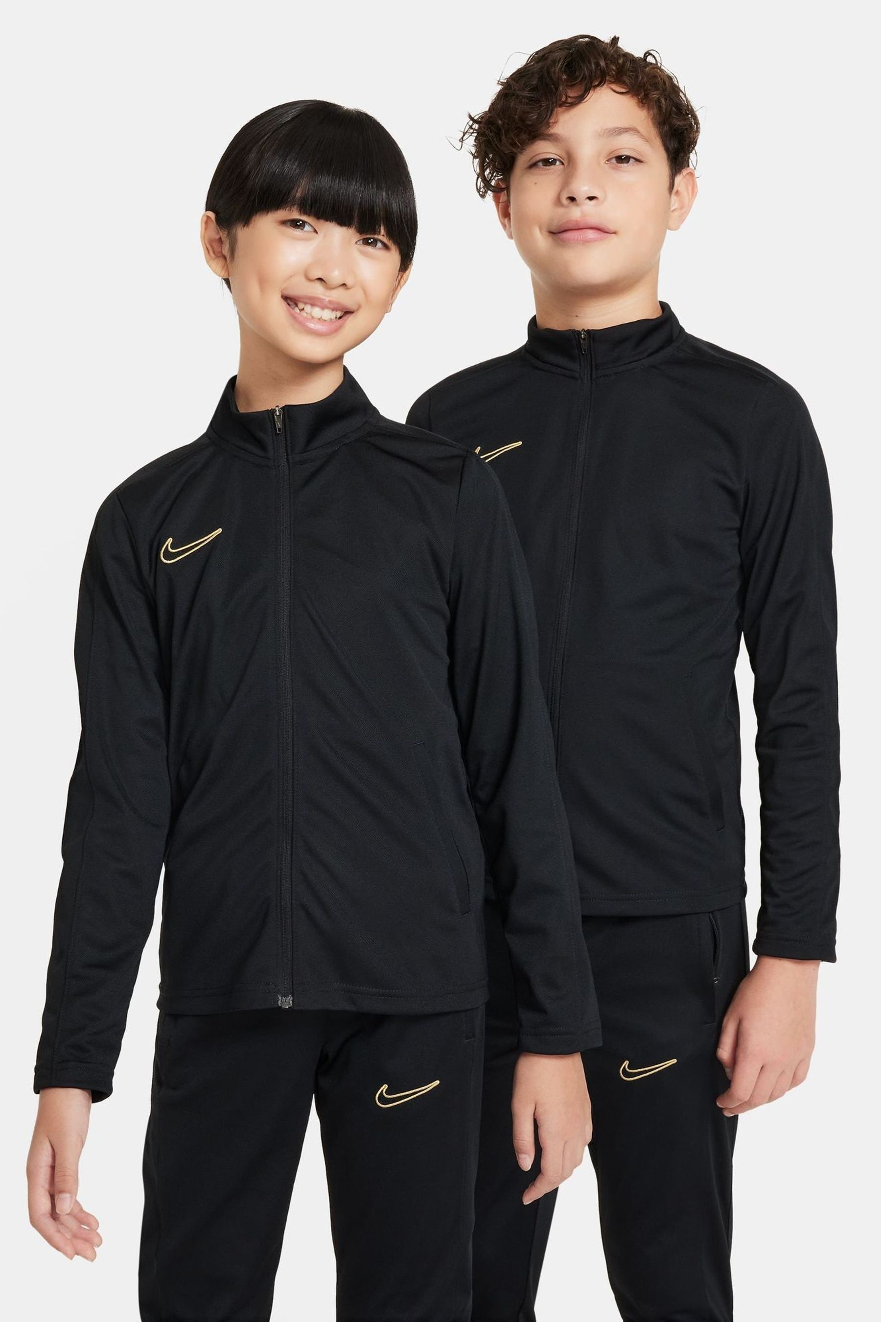 Nike new arrivals gold tracksuit