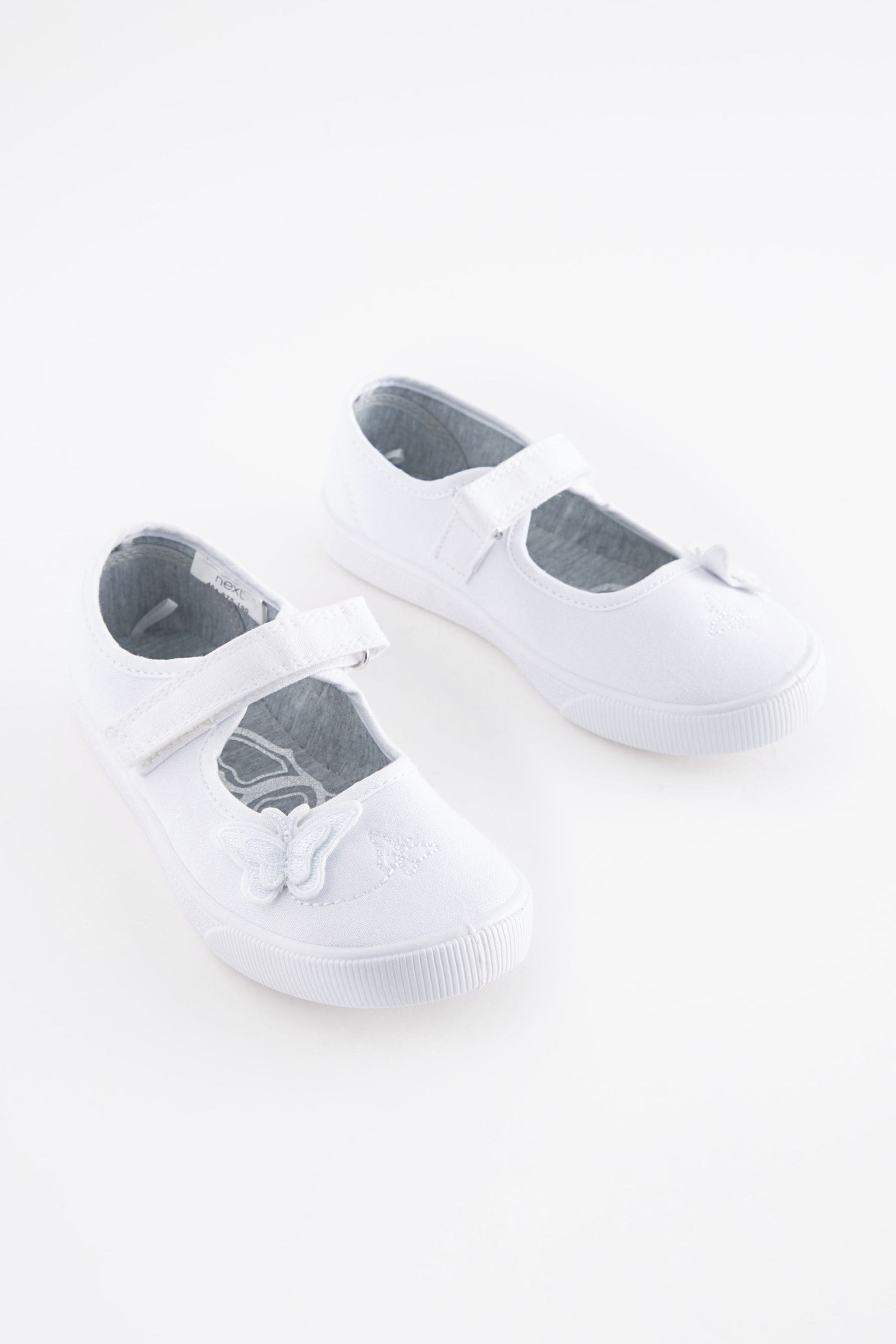 Buy White Standard Fit F Butterfly Embroidered School Plimsoll Shoes from the Next UK online shop