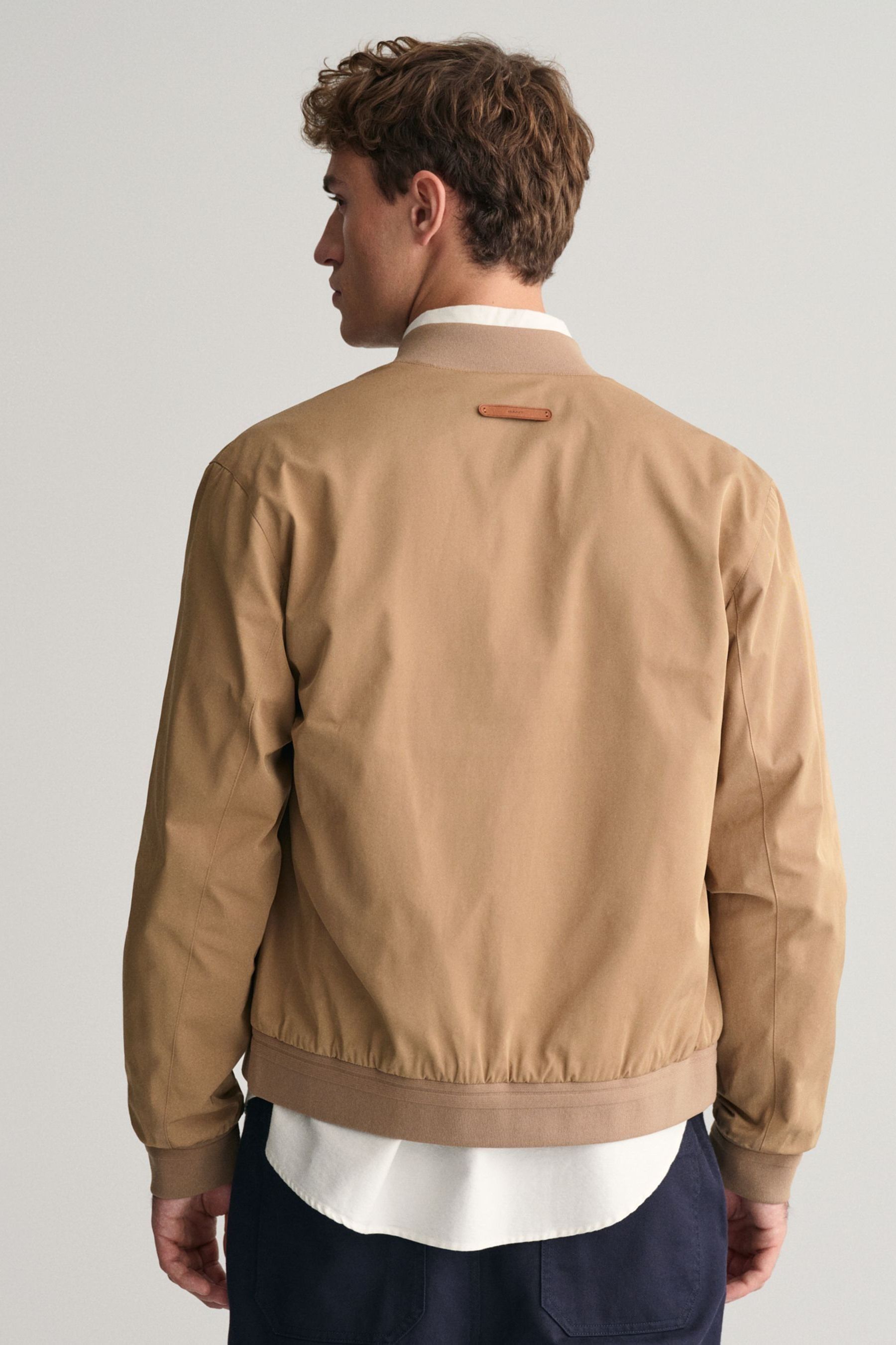 Buy GANT Cream Lightweight Water Repellent Cotton Mix Bomber Jacket from Next Luxembourg