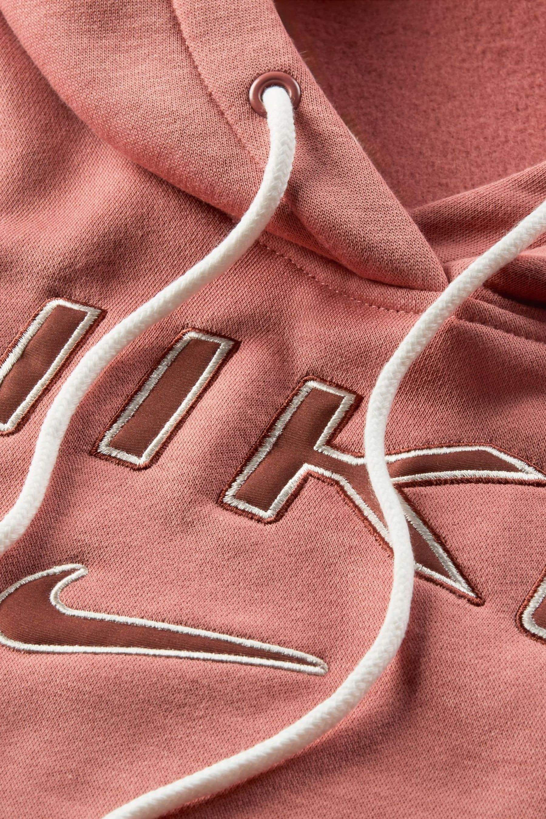 Buy Nike Pink Phoenix Fleece Standard Pullover Varsity Logo Hoodie from Next Ireland