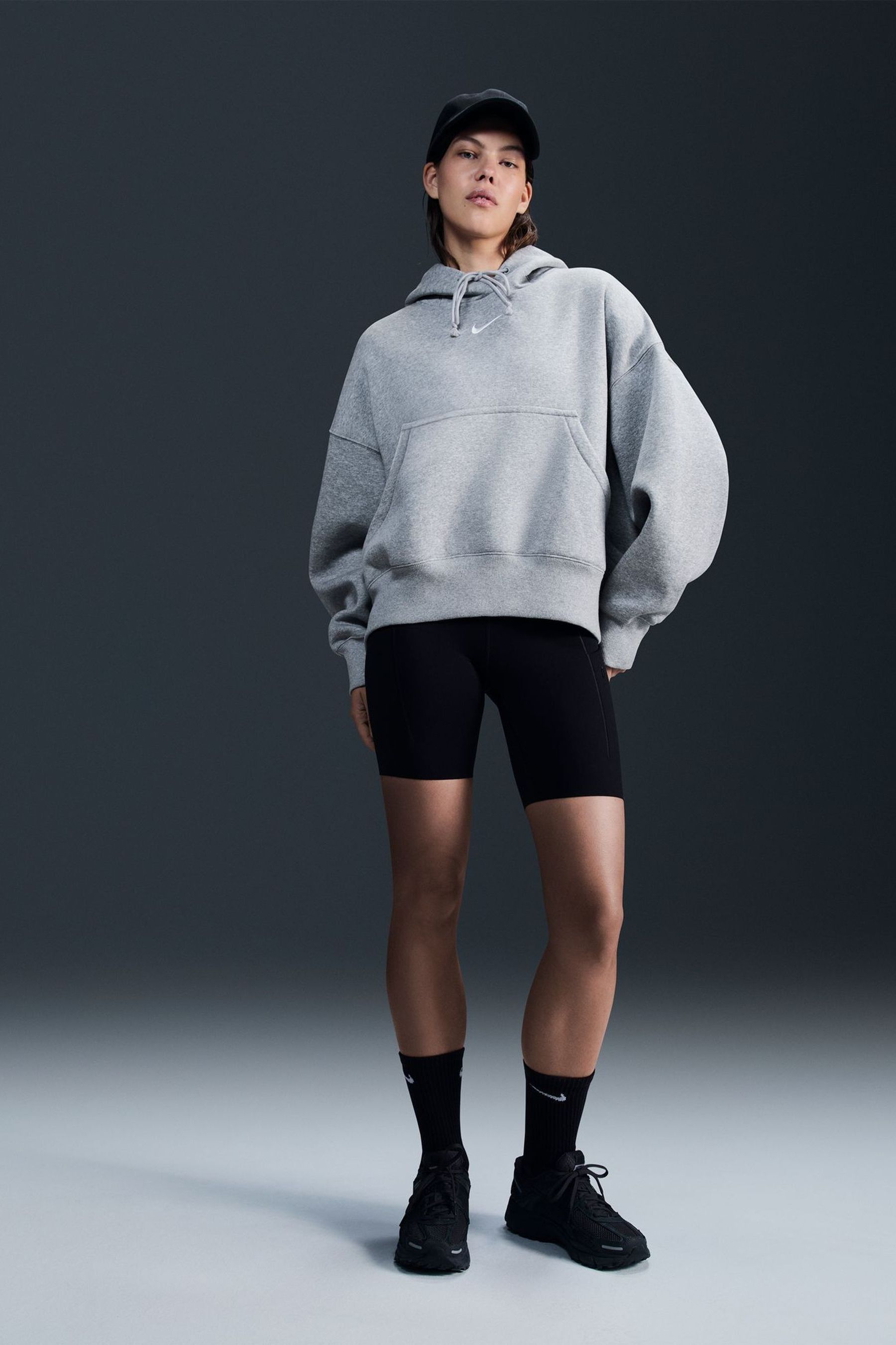Buy Nike Dark Grey Heather Phoenix Fleece Over Oversized Mini Swoosh Pullover Hoodie from the Next UK online shop