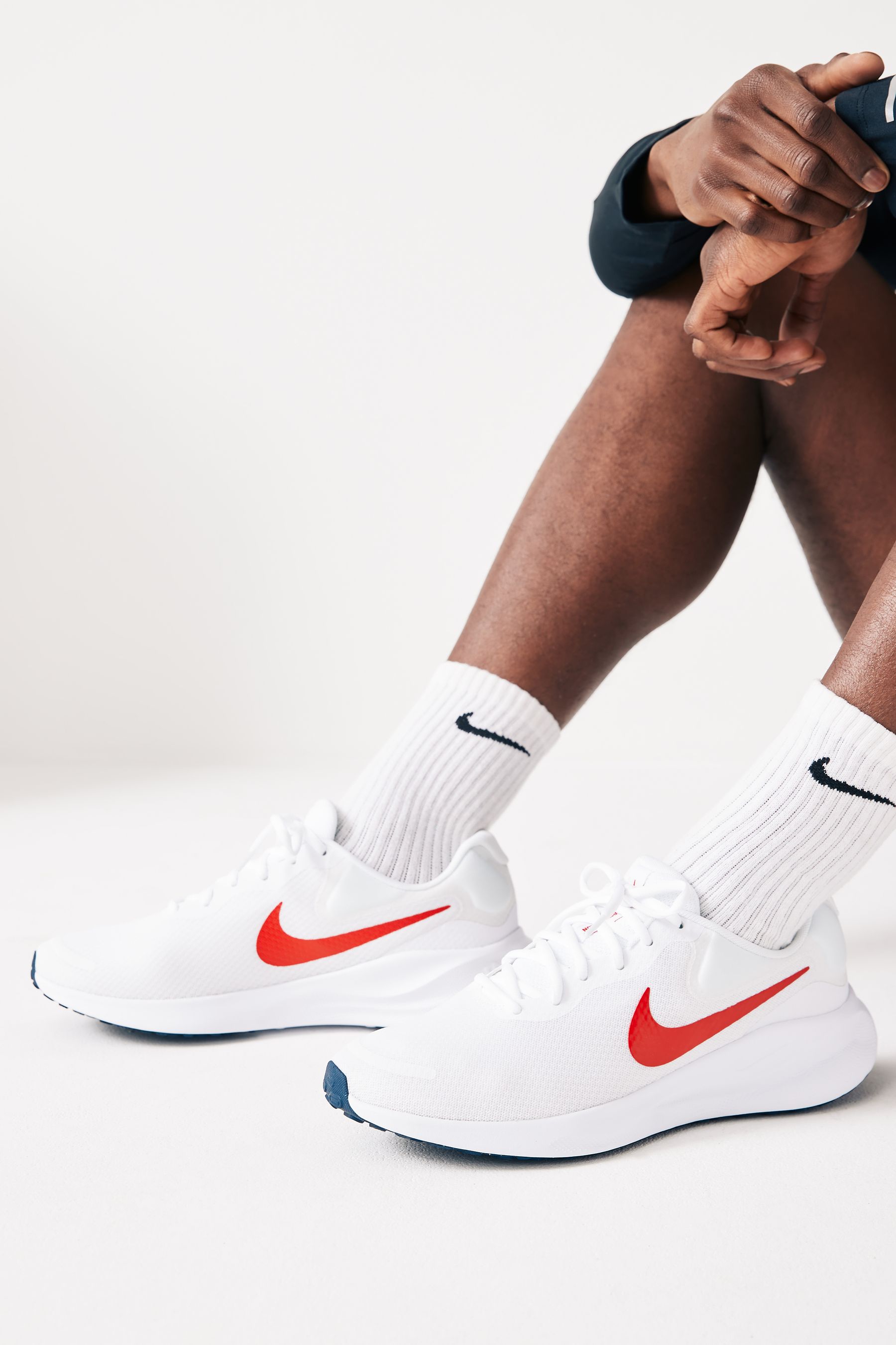 Red sales running trainers
