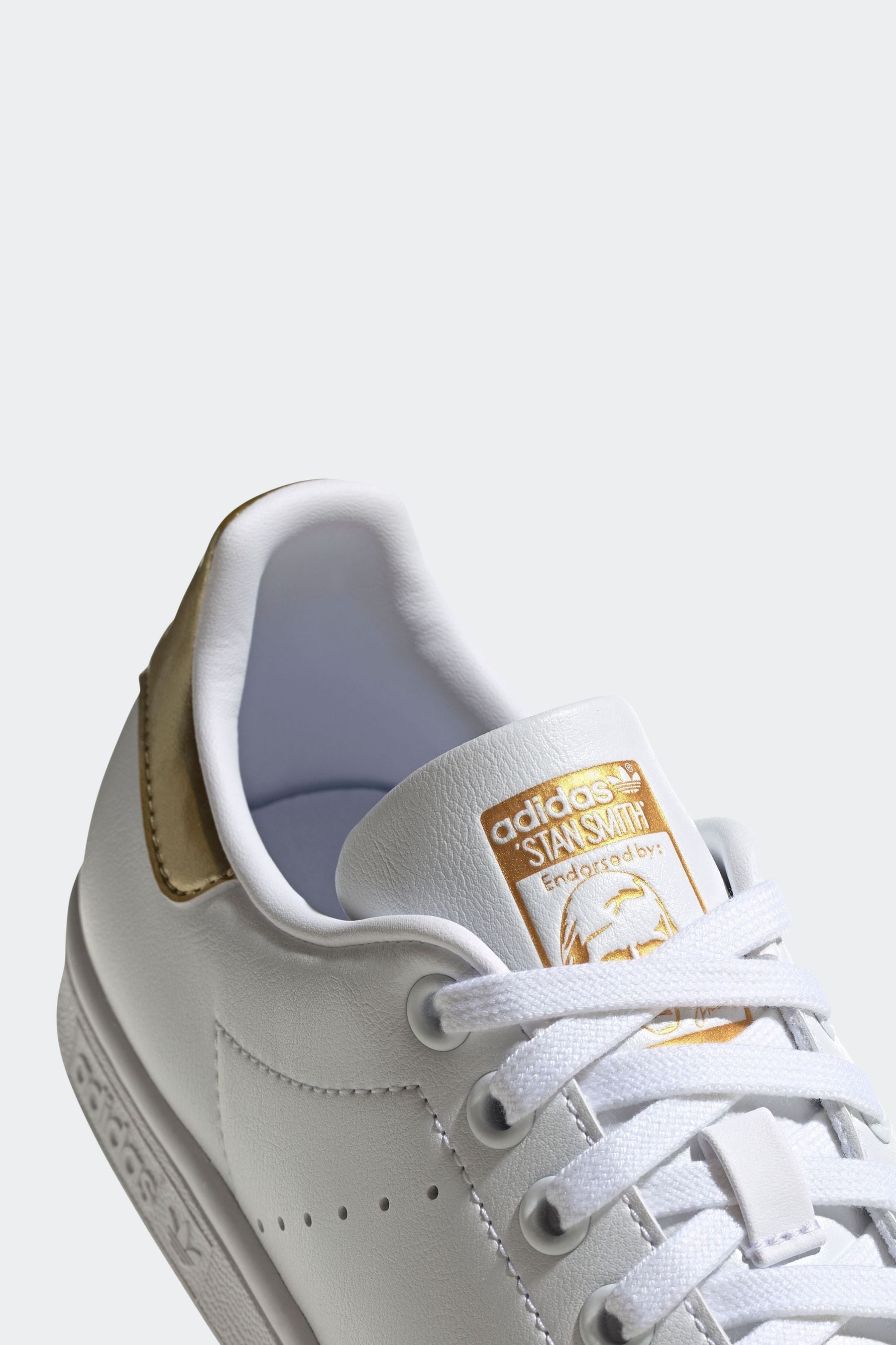 Gold adidas stan smith top