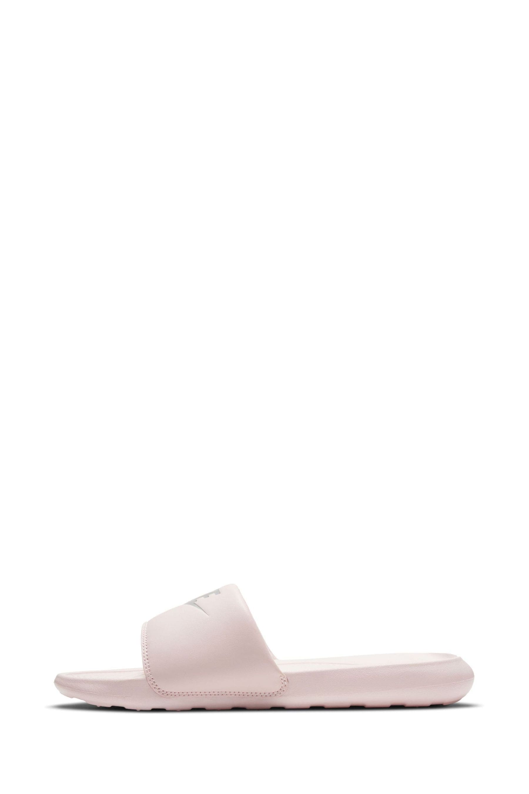 Baby pink nike slides hotsell