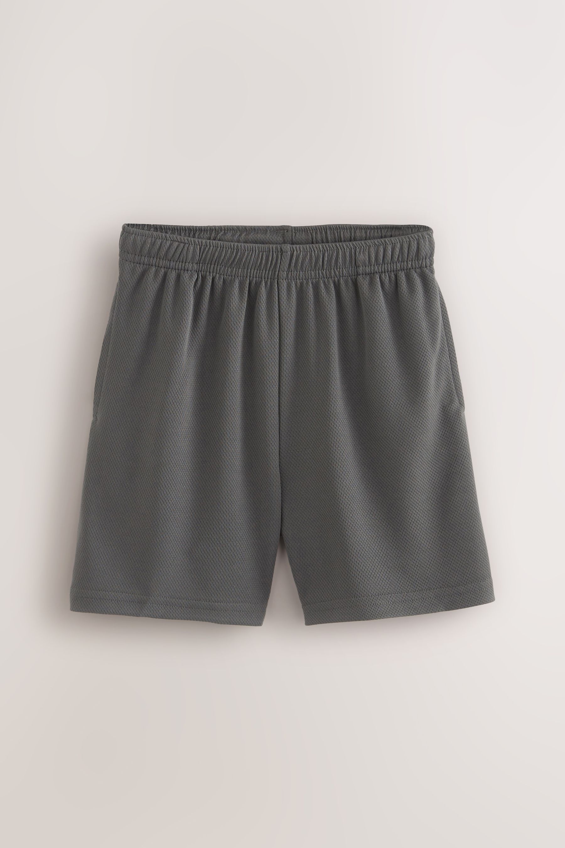 Grey football shorts top
