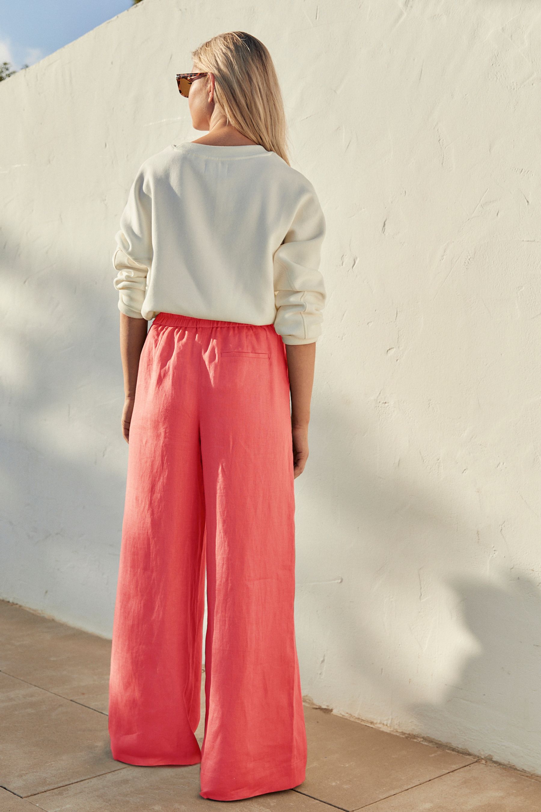 Buy Coral Pink Premium 100 Linen Wide Leg Trousers from Next Luxembourg