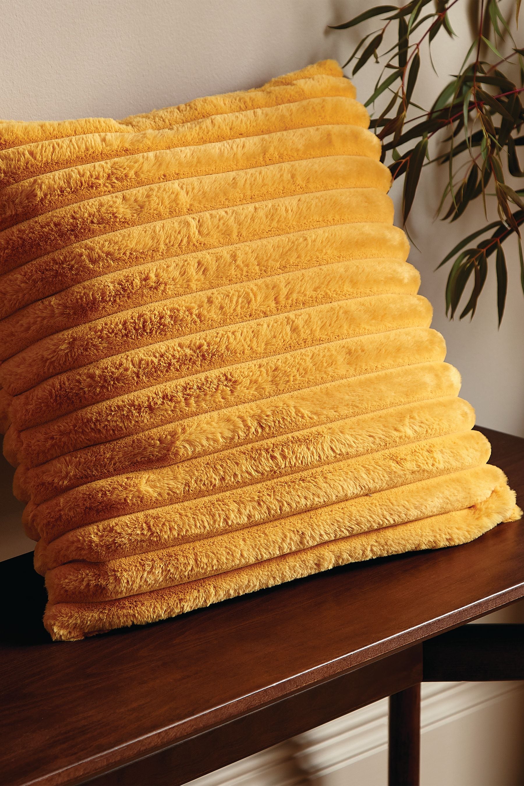 Mustard fur discount cushion