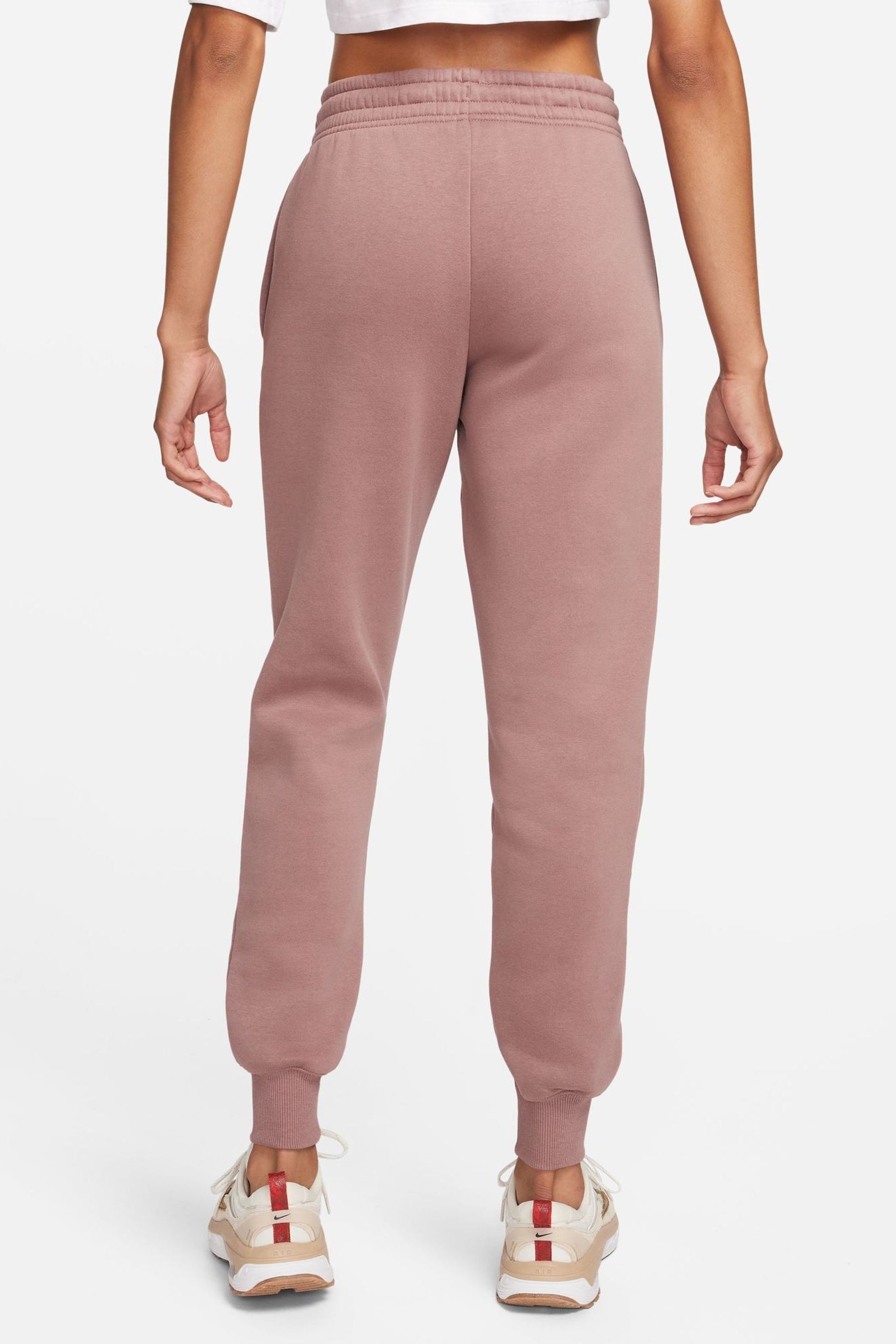 Brown nike joggers store