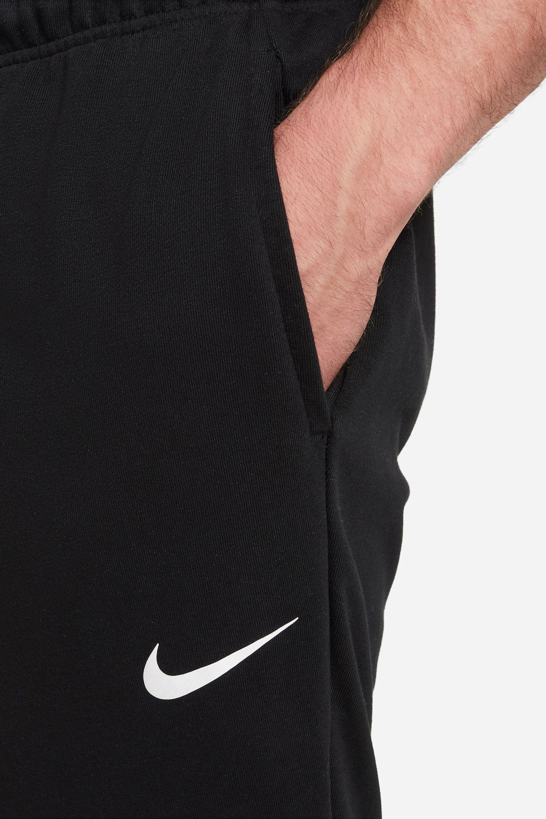 Men's tapered fleece training trousers discount
