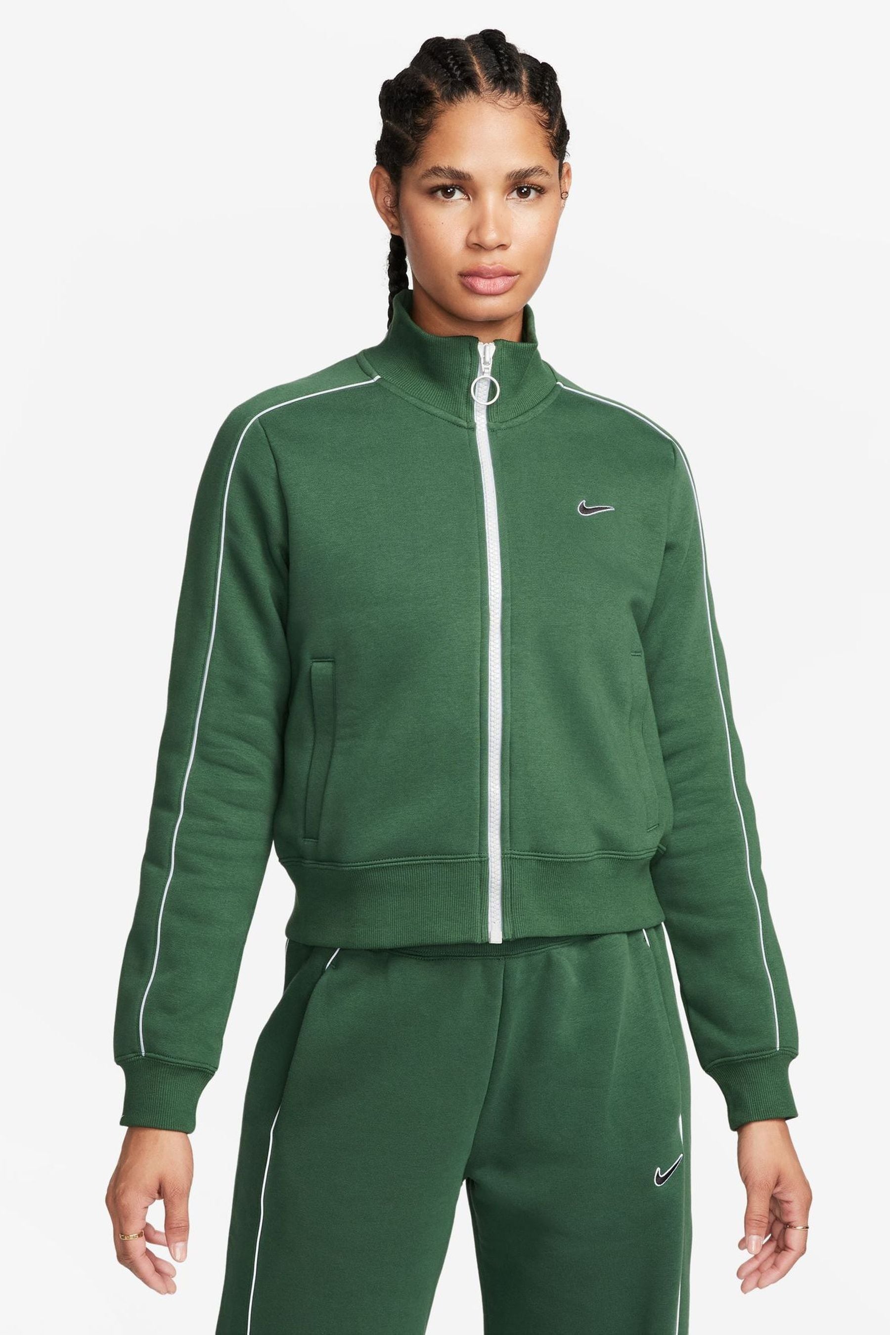Nike tracksuit with stripe on sale