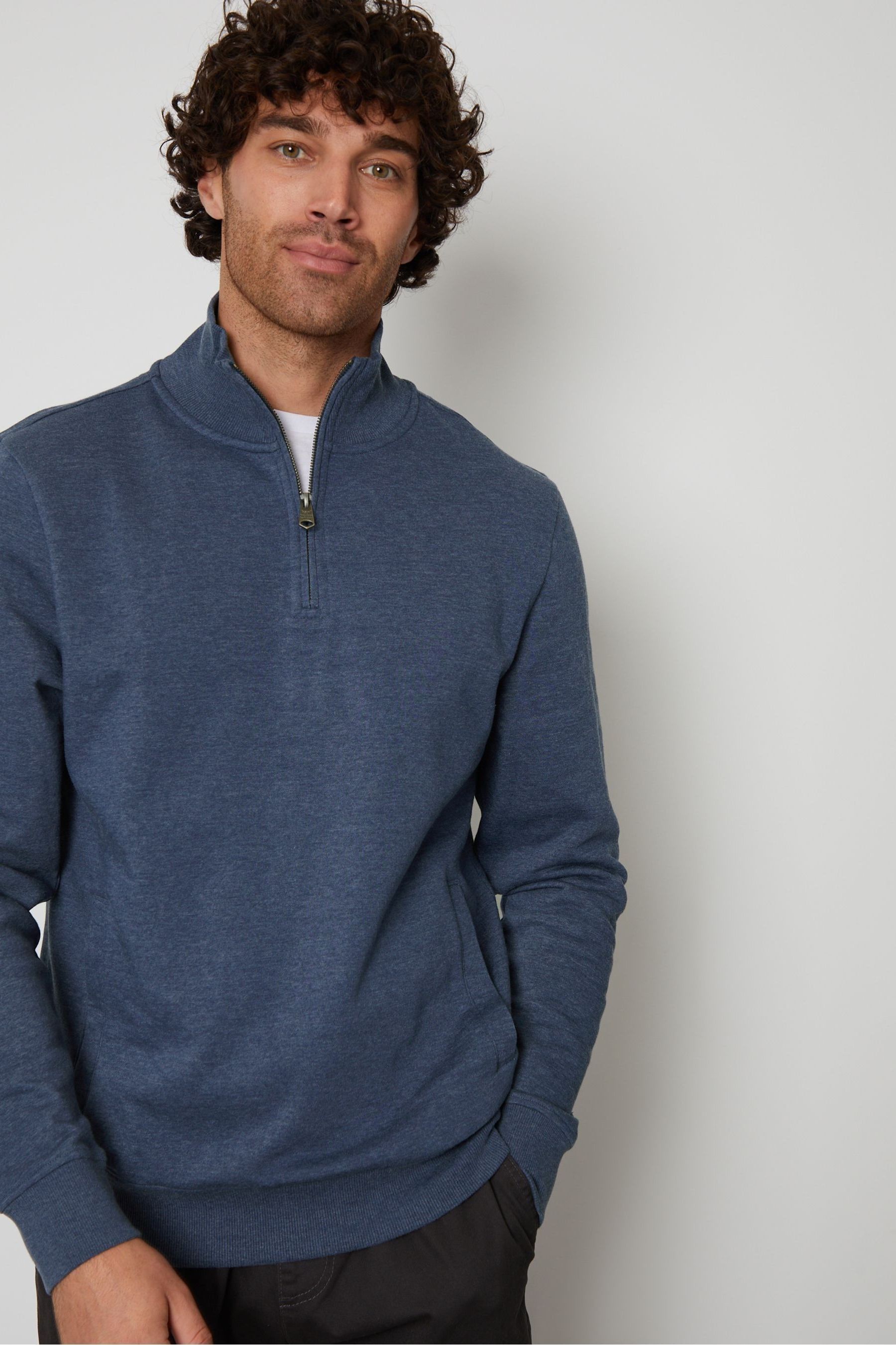 Quarter zip pullover with front pocket clearance