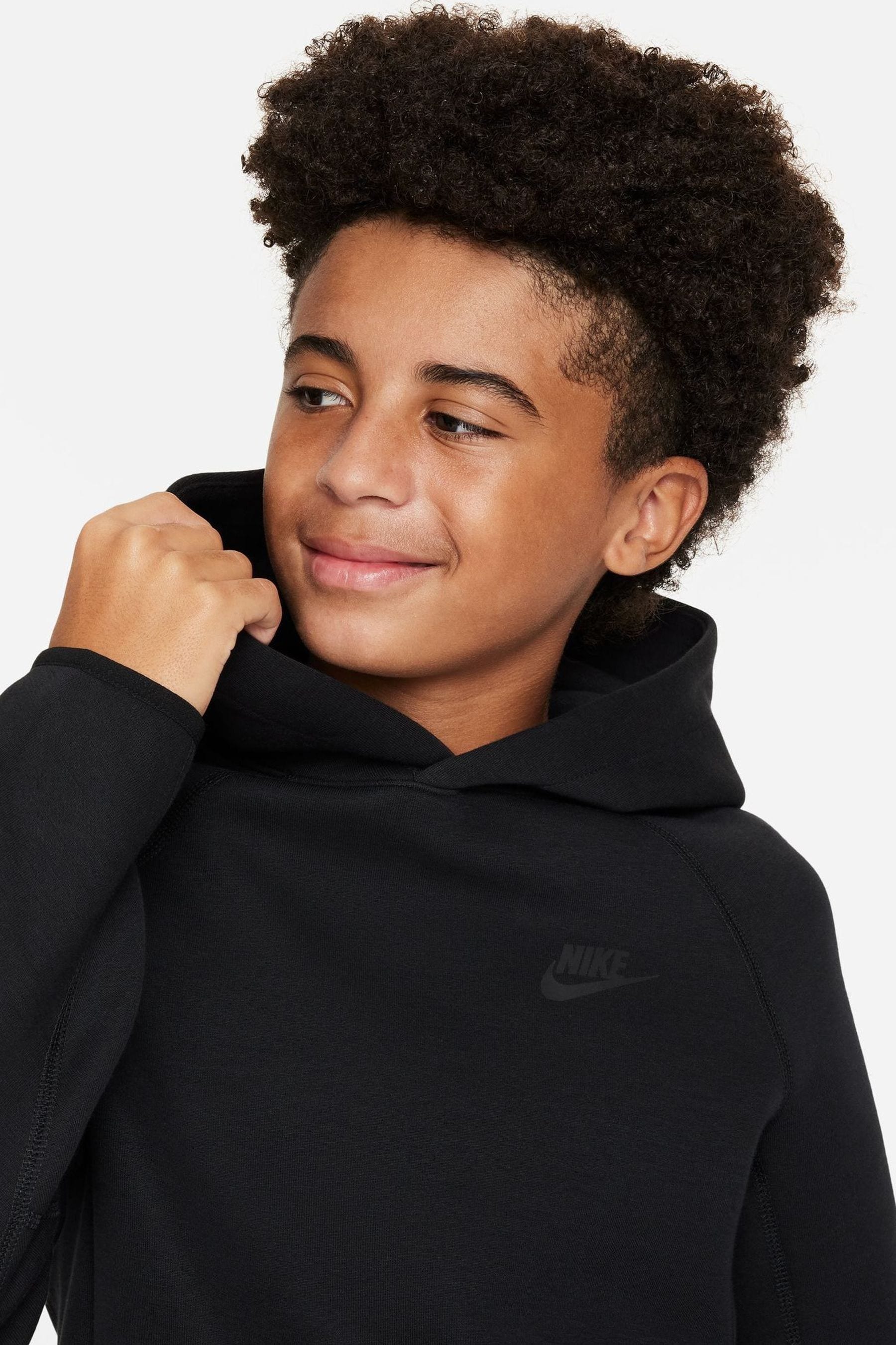 Nike modern overhead hooded top black top