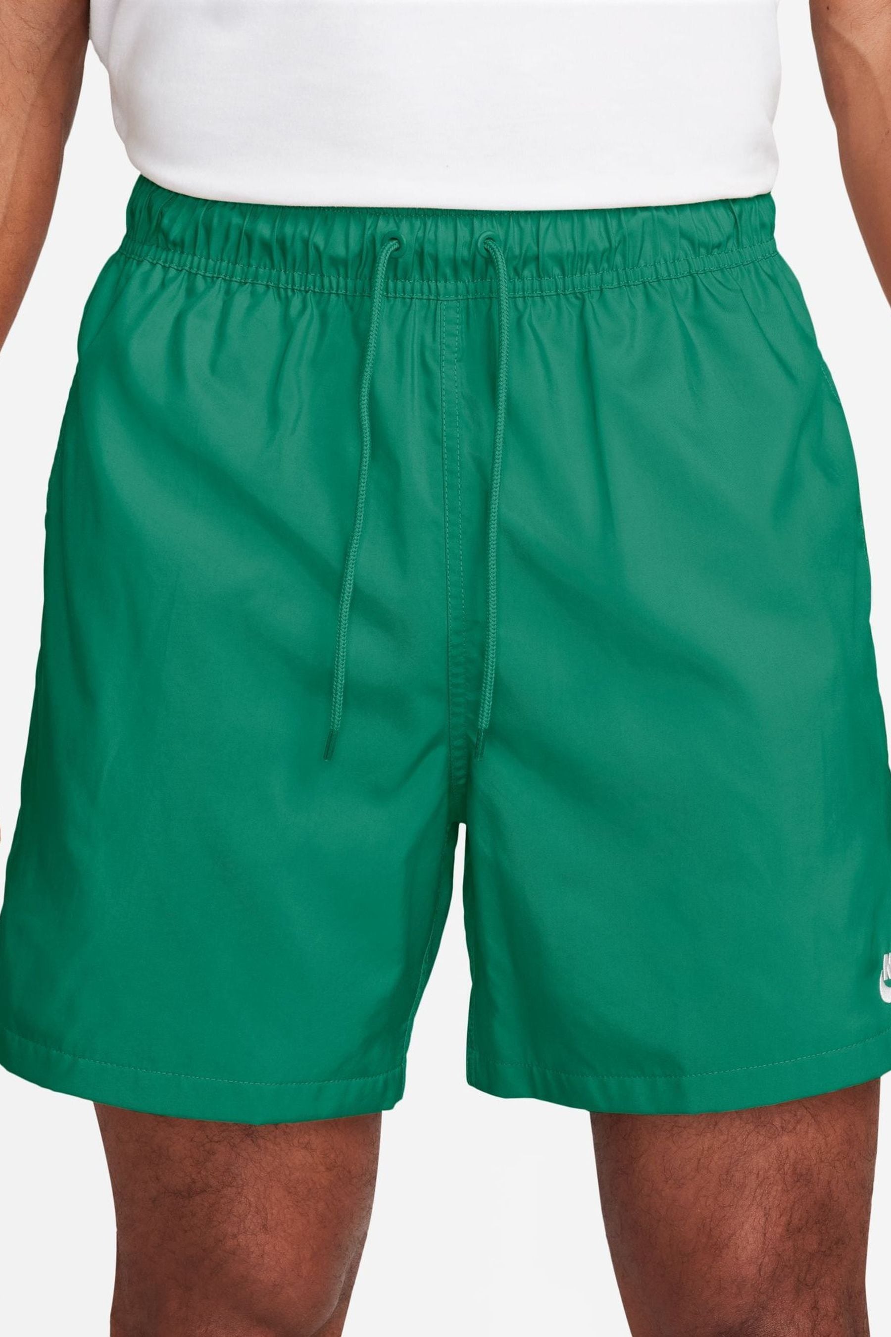 Buy Nike Green Club Woven Flow Shorts from Next Slovakia