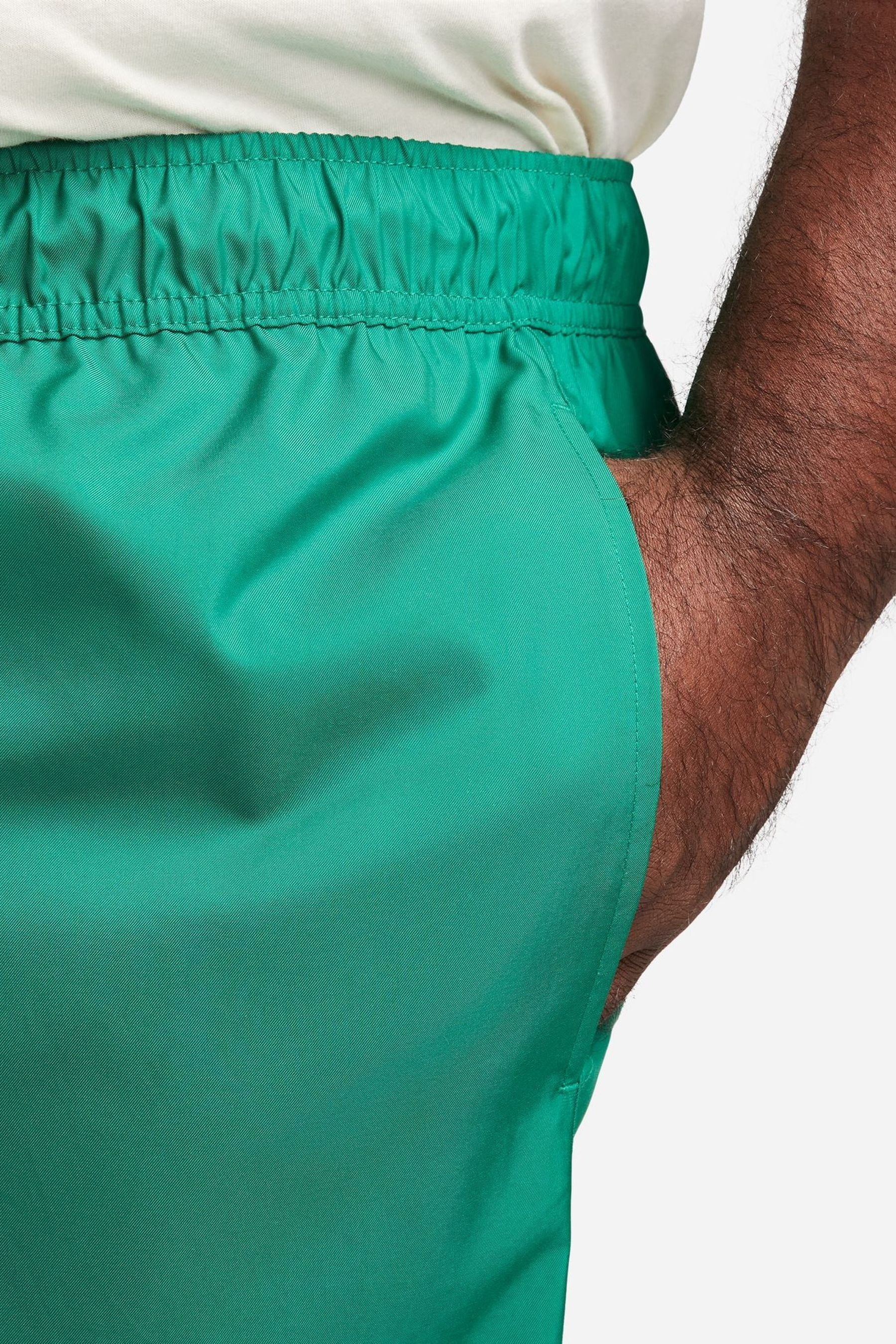 Buy Nike Green Club Woven Flow Shorts from the Next UK online shop