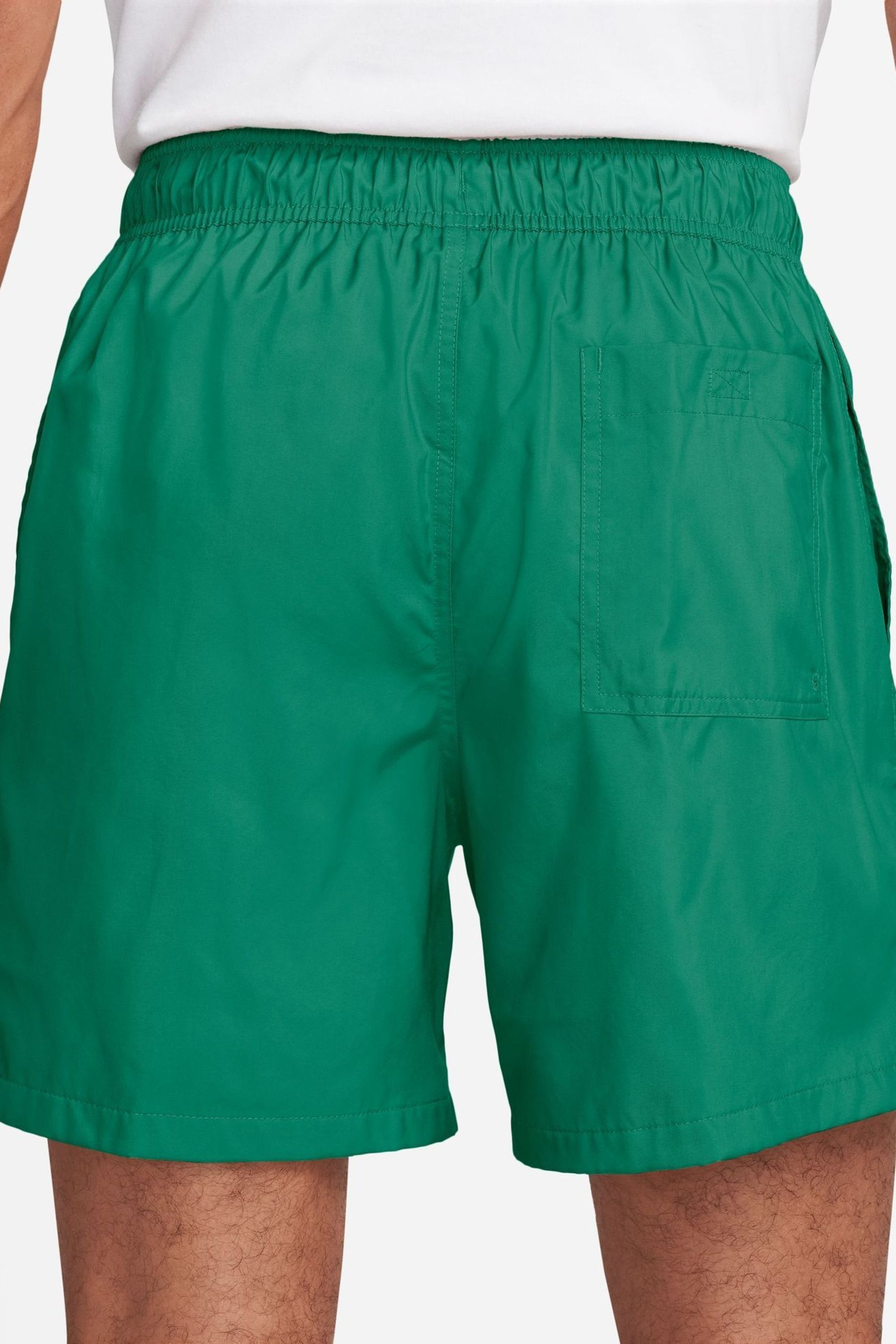 Nike flow shorts green shop