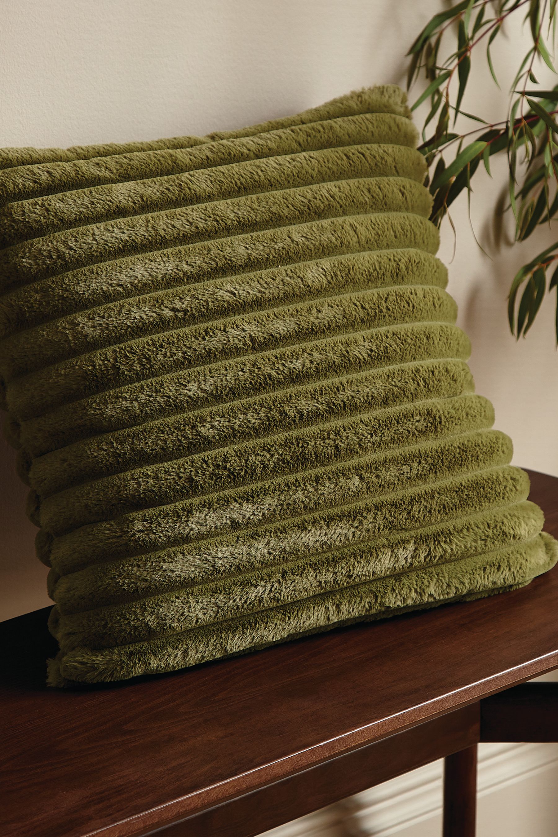 Green faux cheap fur cushion