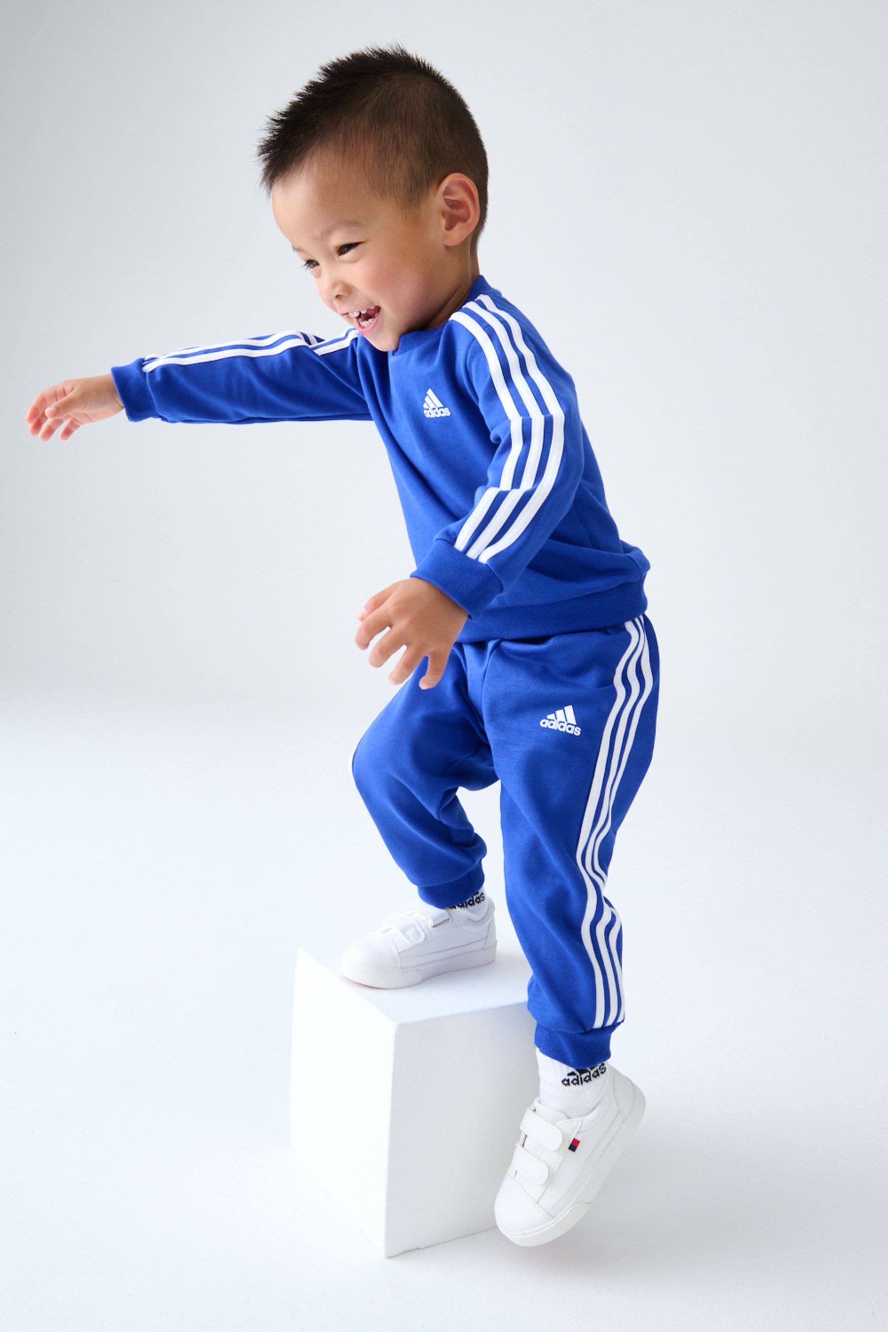 Buy adidas Blue White Kids Essentials 3 Stripes Jogger Set from Next Ireland