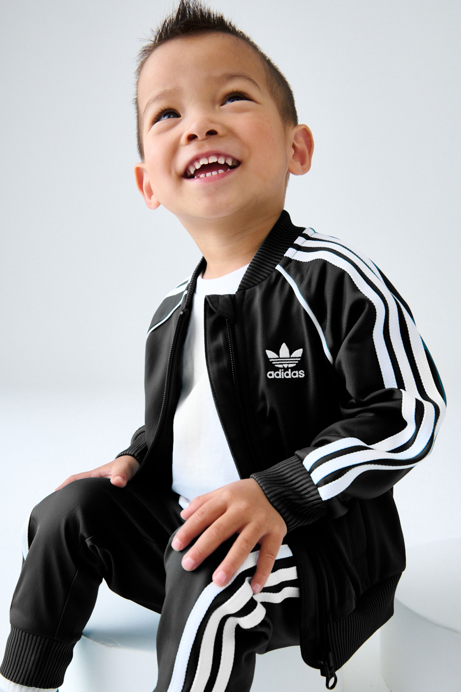Adidas original sst tracksuit clearance