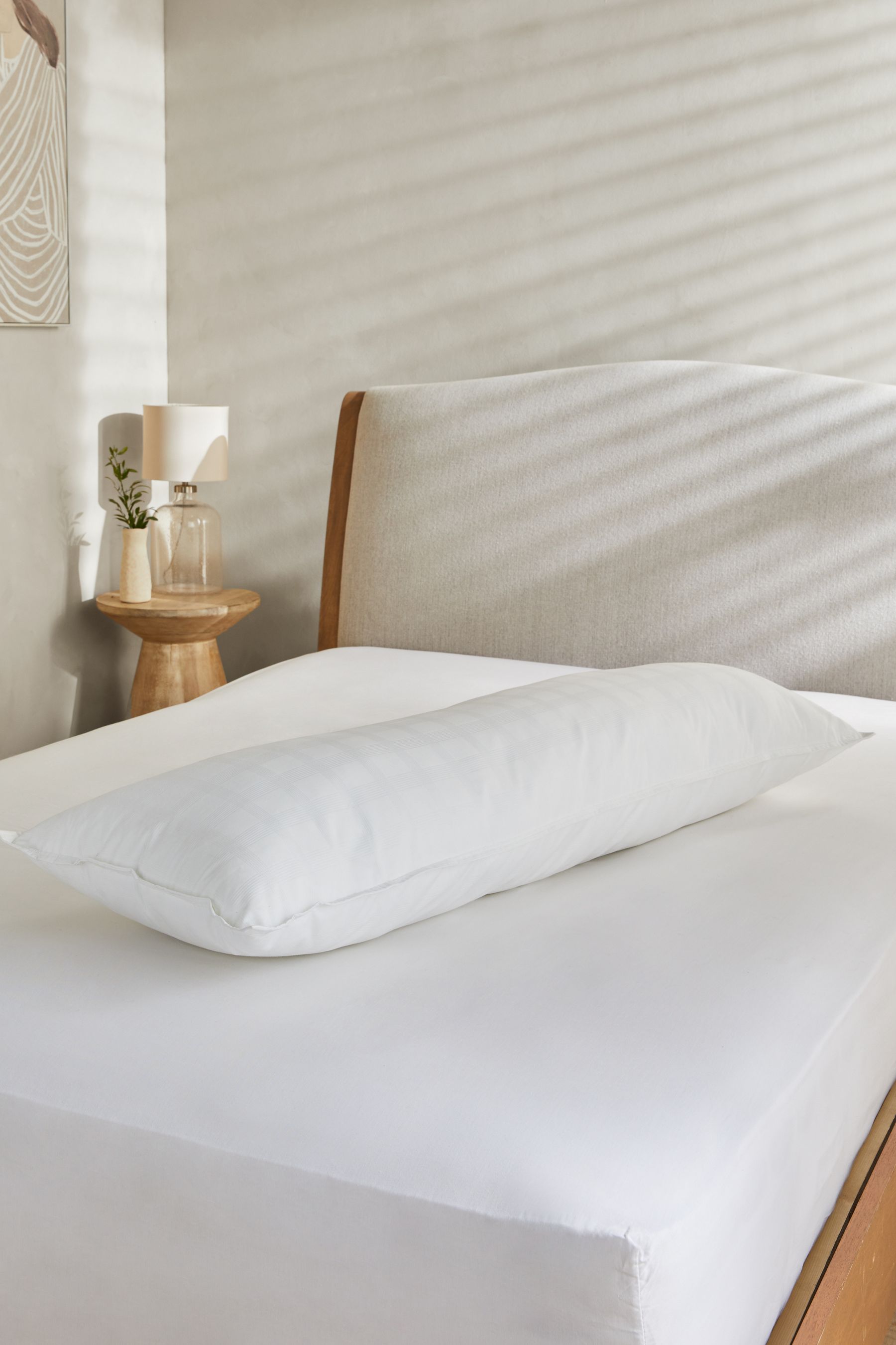 Buy Large Bolster Feels Like Down Pillow from the Next UK online shop