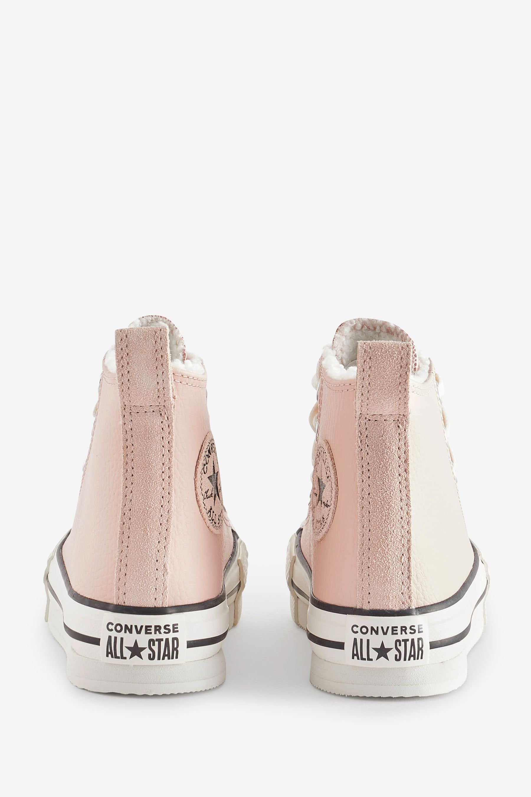 Pink converse junior sale