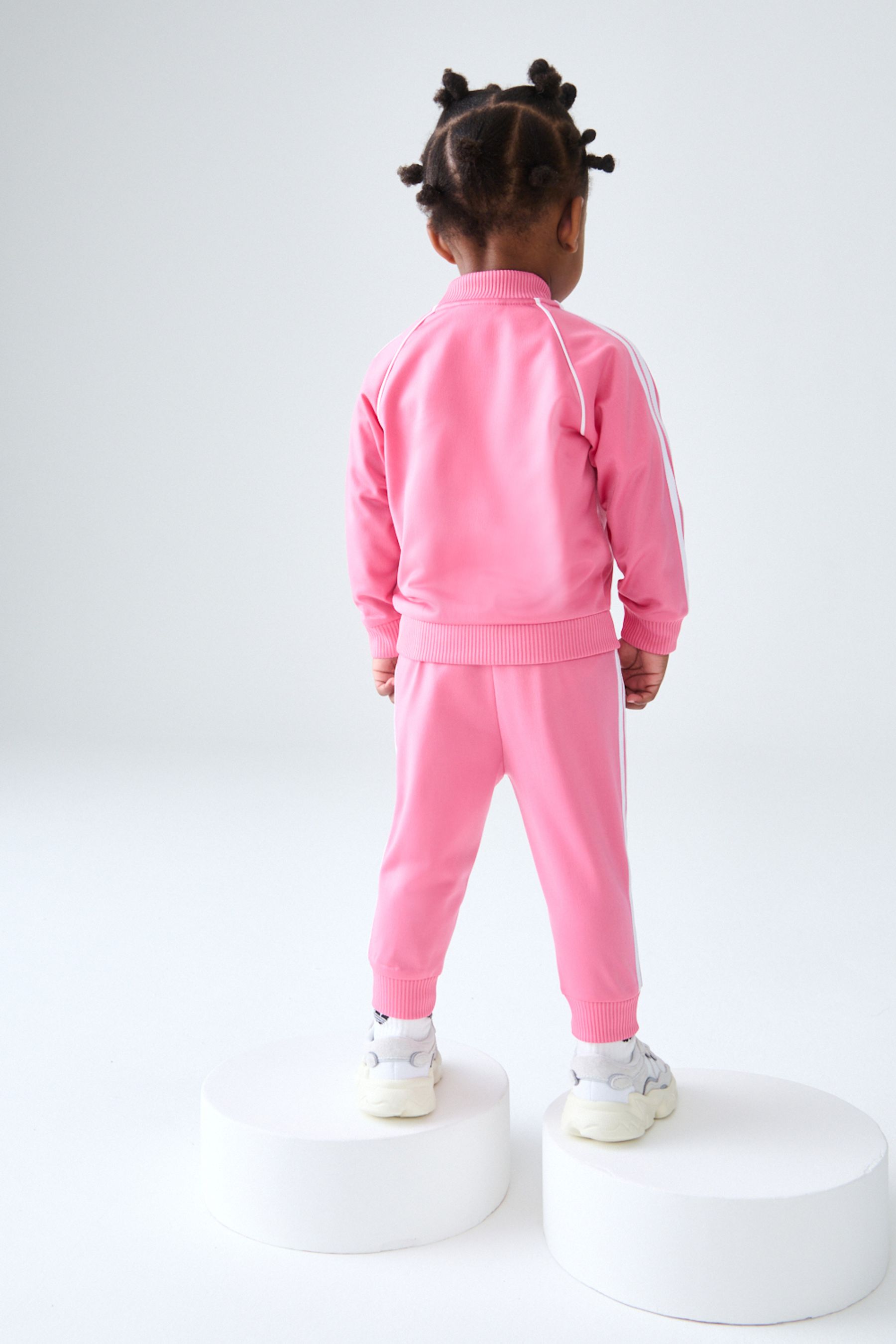 Adidas pink sst tracksuit discount