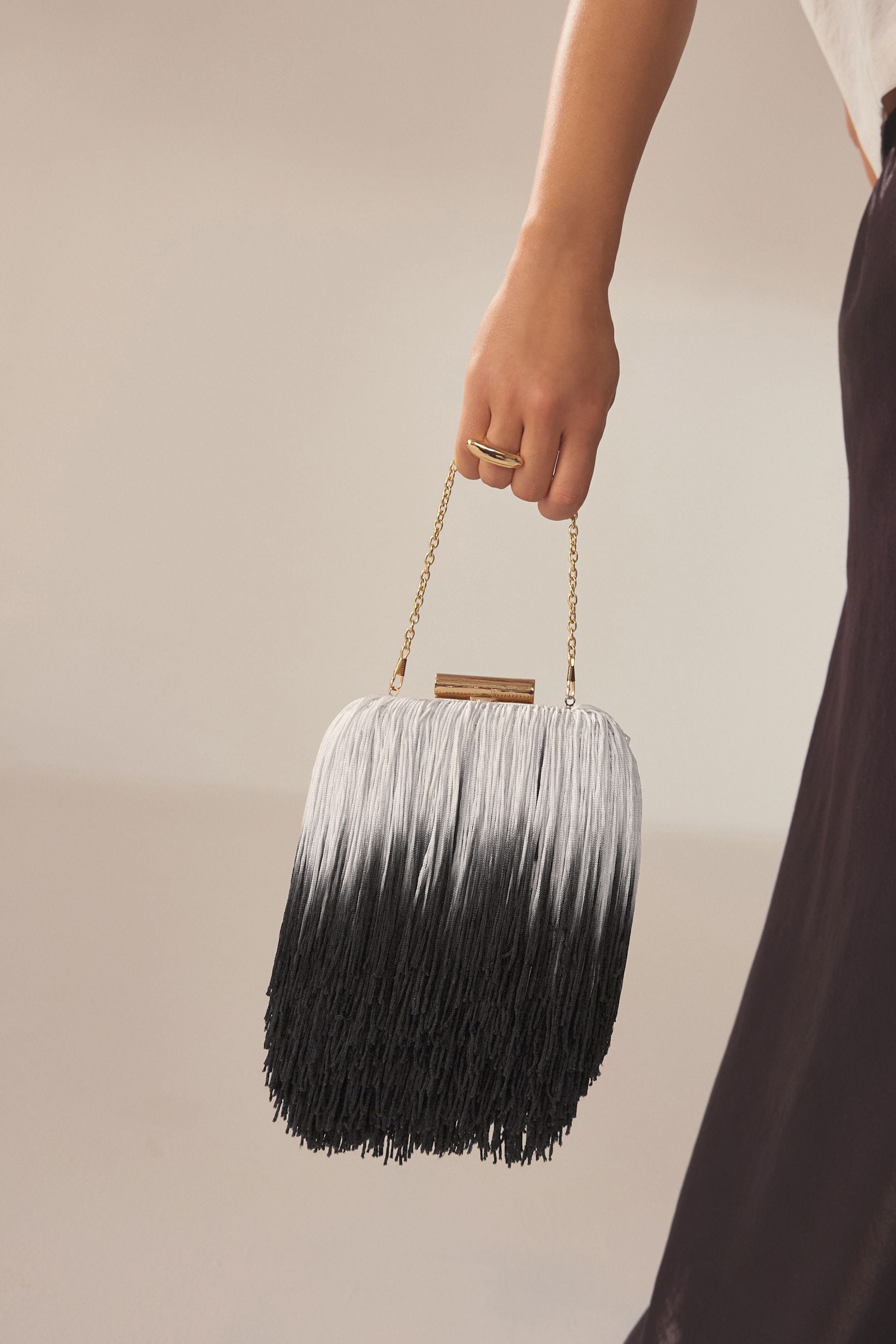 Buy Black White Ombre Tassel Clutch Bag from Next Saudi Arabia