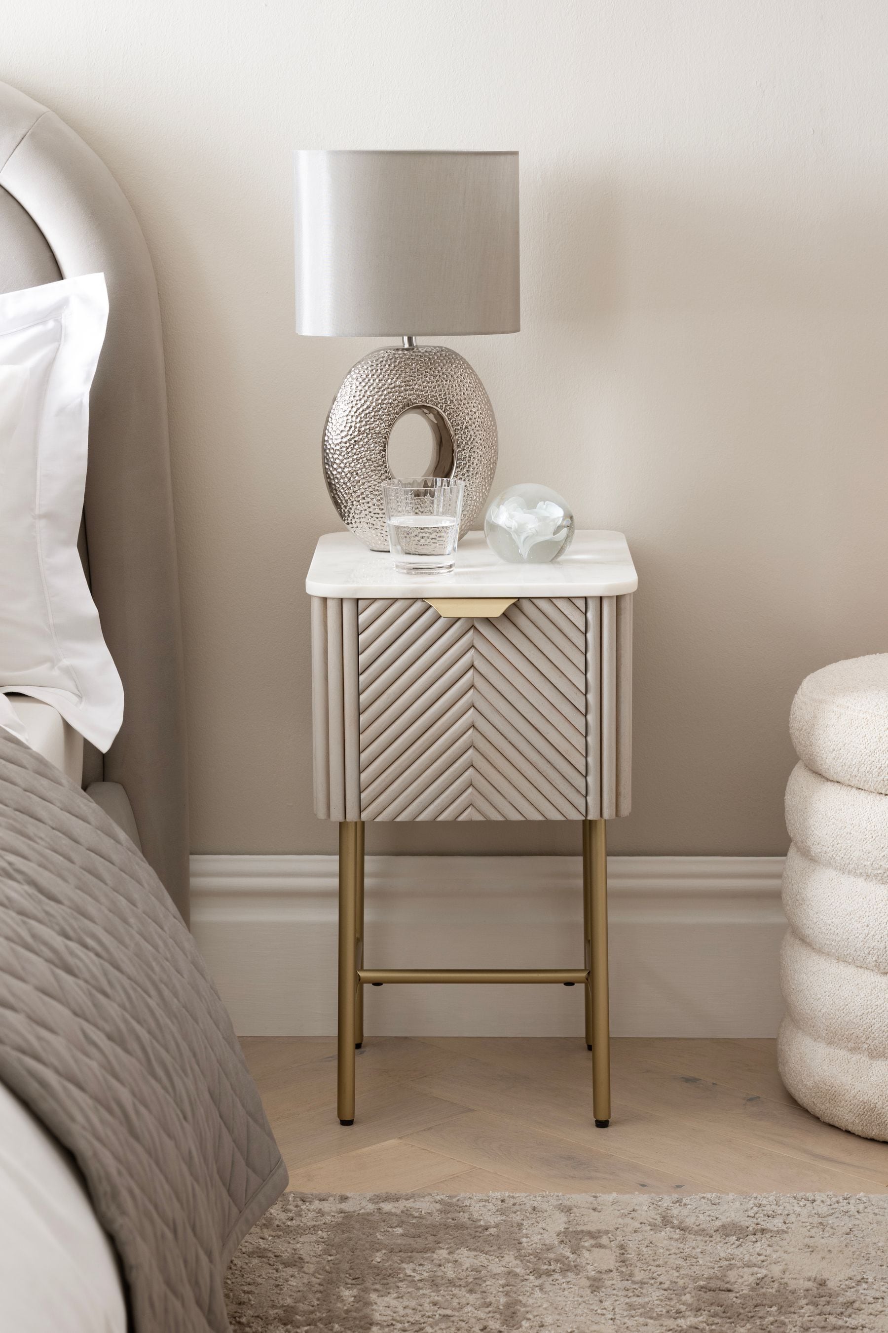 Light grey wood bedside outlet table