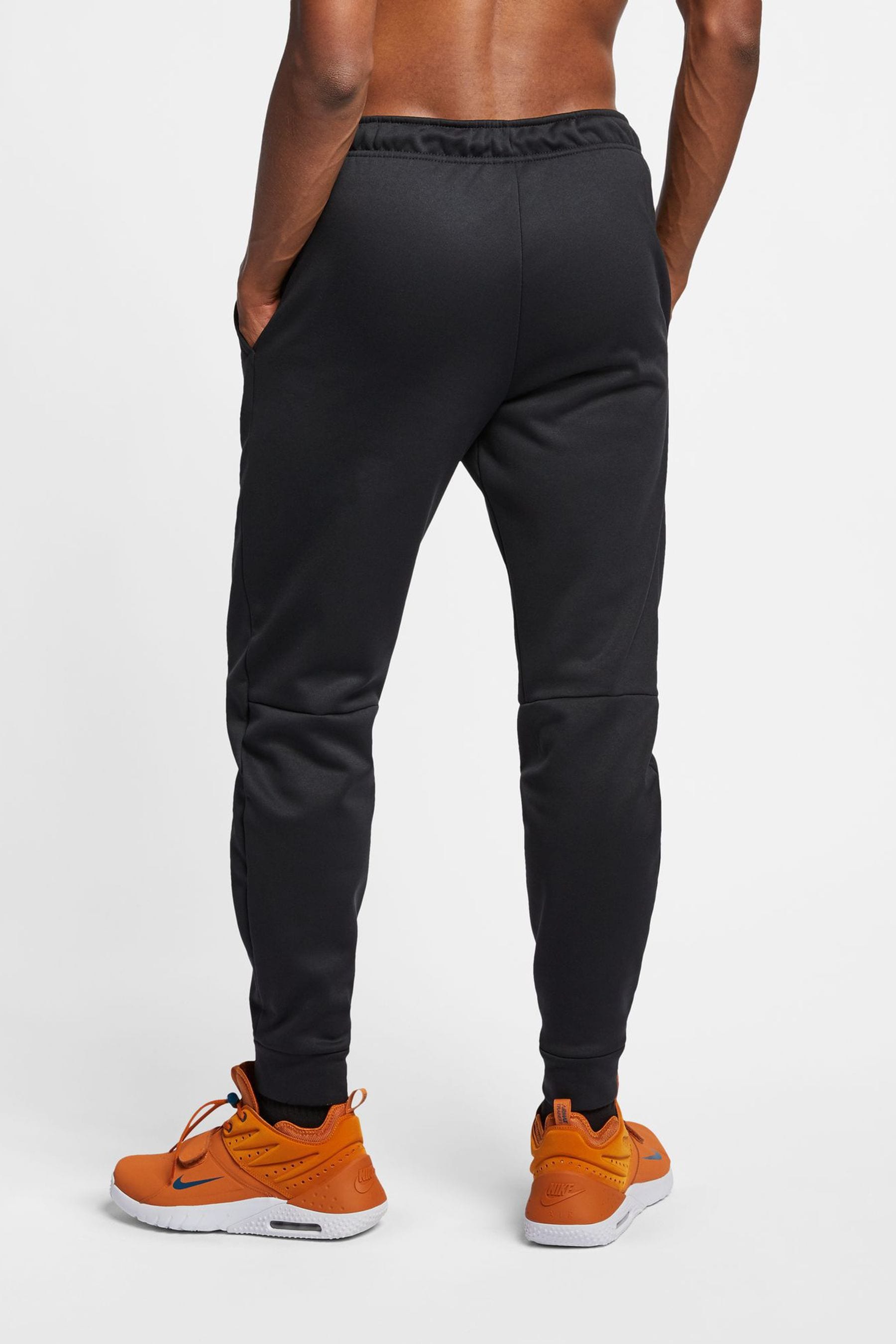 Buy Nike Black Therma FIT Tapered Training Joggers from the Next