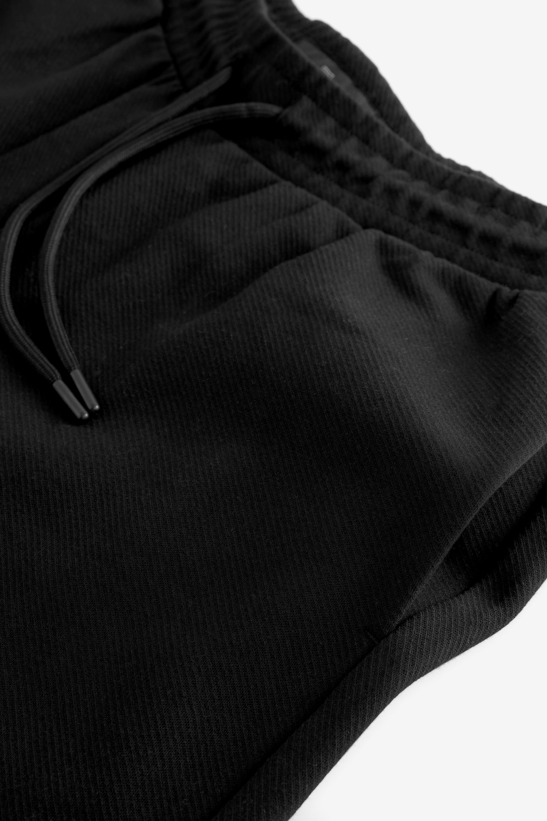 Buy Black Smart Tapered Joggers from Next United Arab Emirates