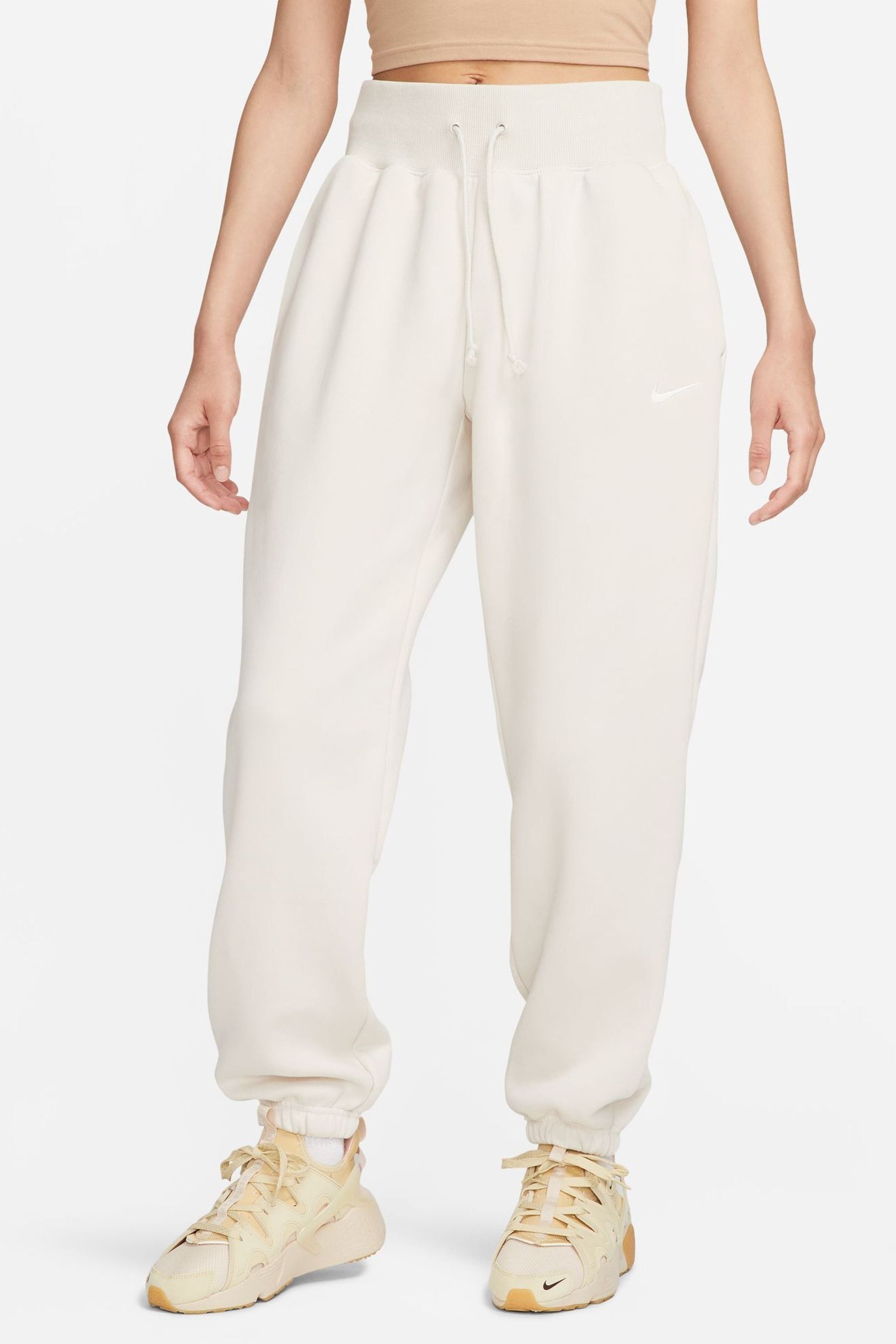 Nike oversized swoosh joggers discount