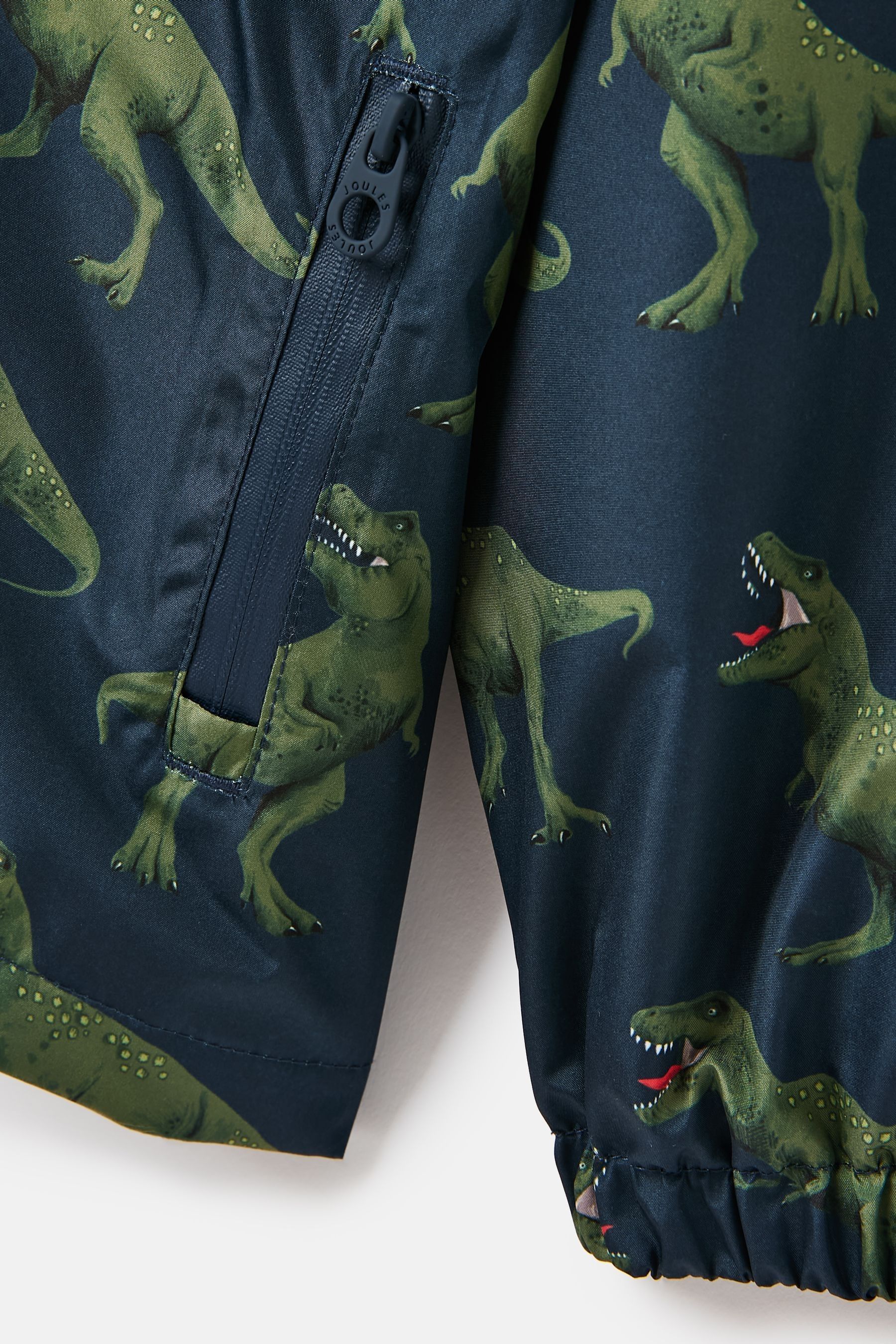 Buy Joules Boys Rainwell Navy Dinosaur Waterproof Raincoat With Hood from Next Canada