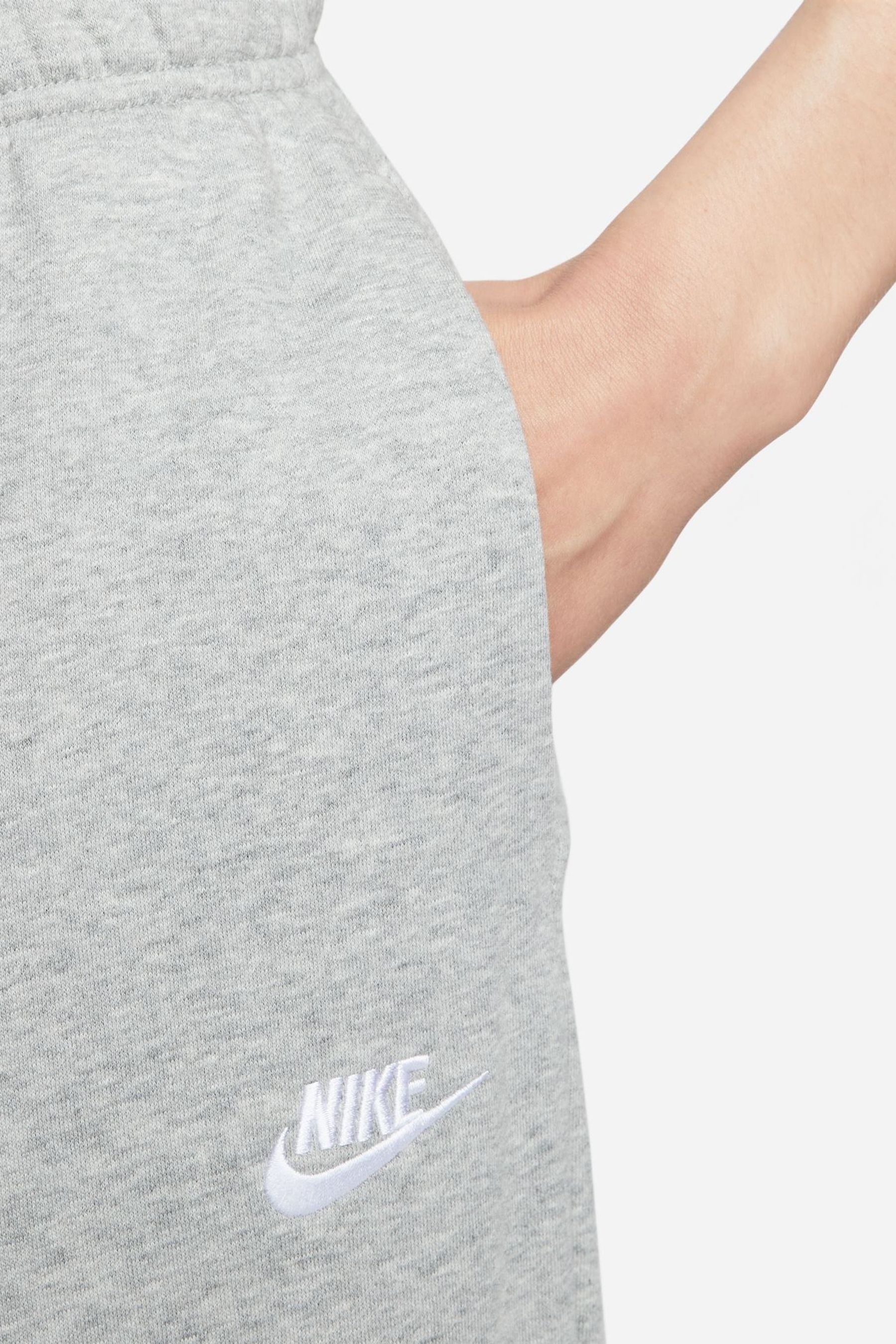 Buy Nike Grey Oversized Mid Rise Club Fleece Sweatpants from the