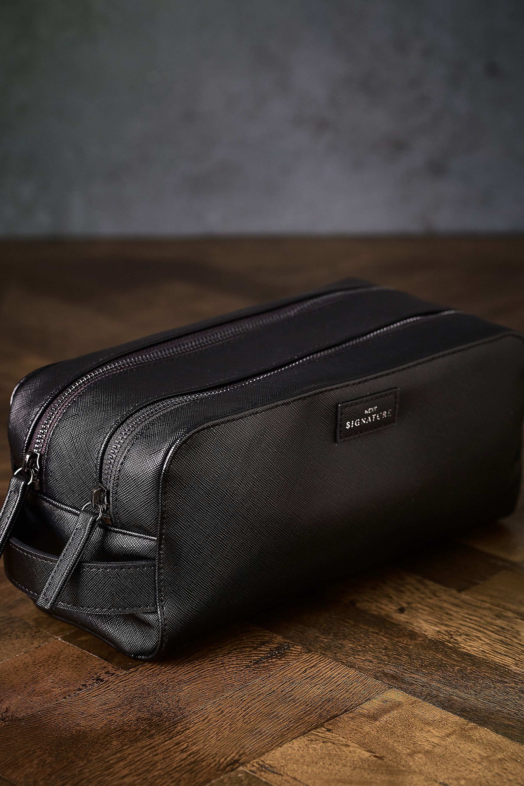 Buy Signature Faux Leather Washbag from the Next UK online shop