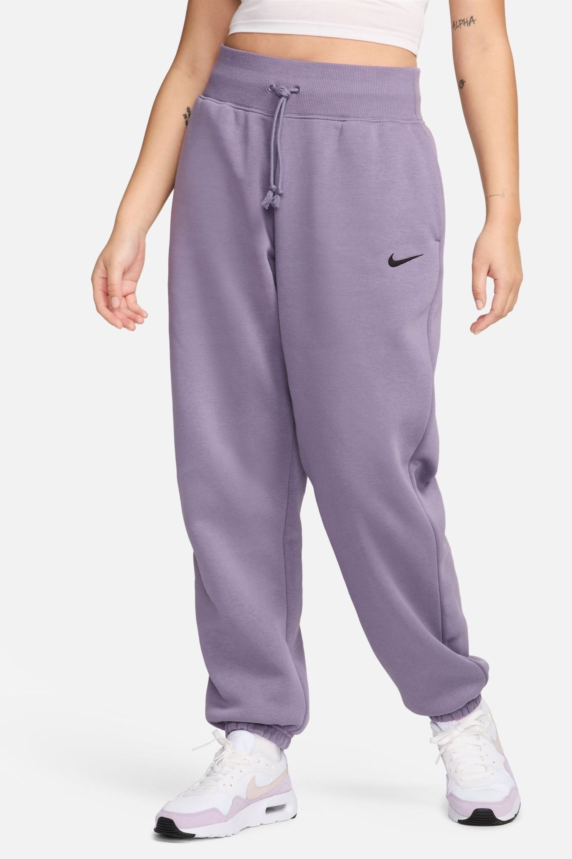 Nike Dark Purple Oversized Mini Swoosh Joggers - Image 1 of 9