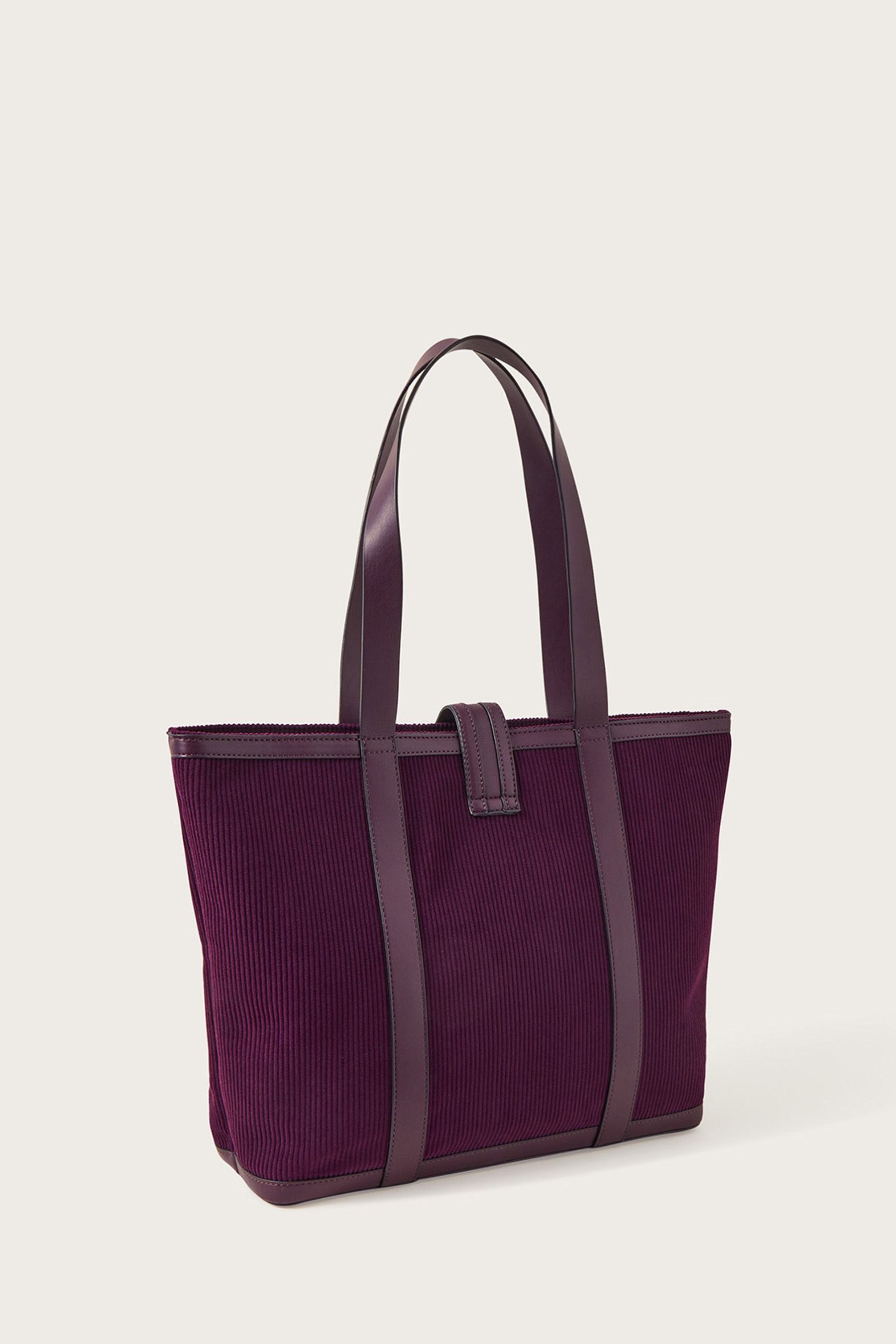 Purple best sale handbags next