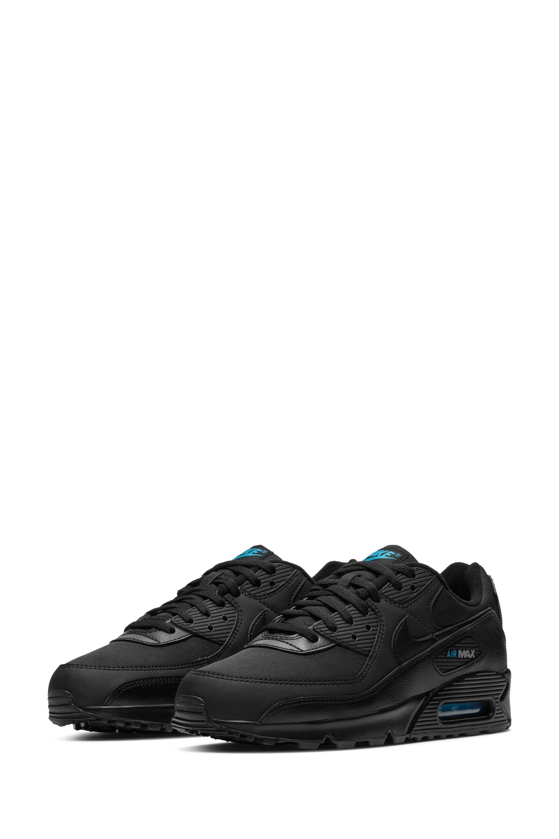 Black and blue trainers top