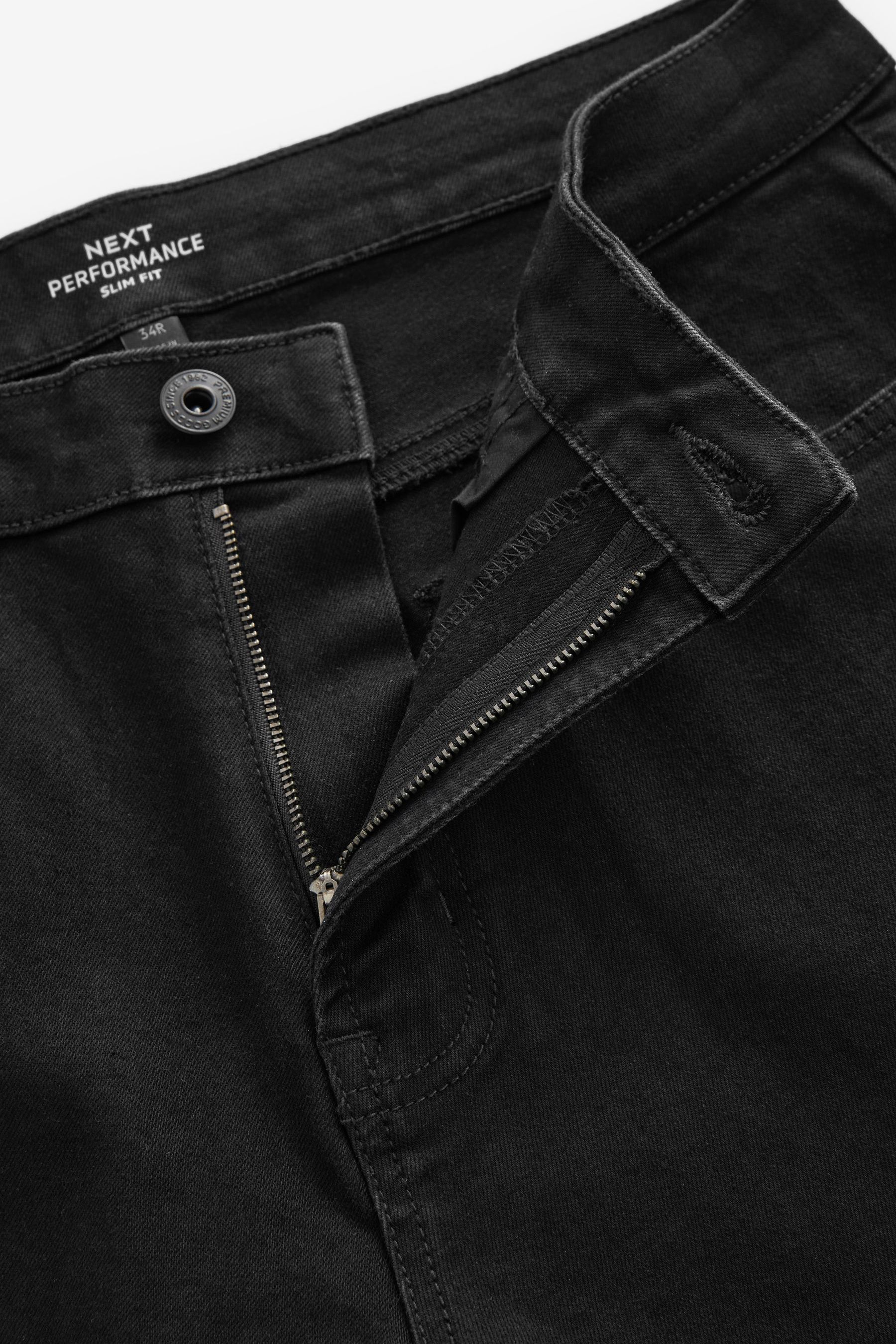 Buy Black Slim Fit Motion Flex Jeans from the Next UK online shop