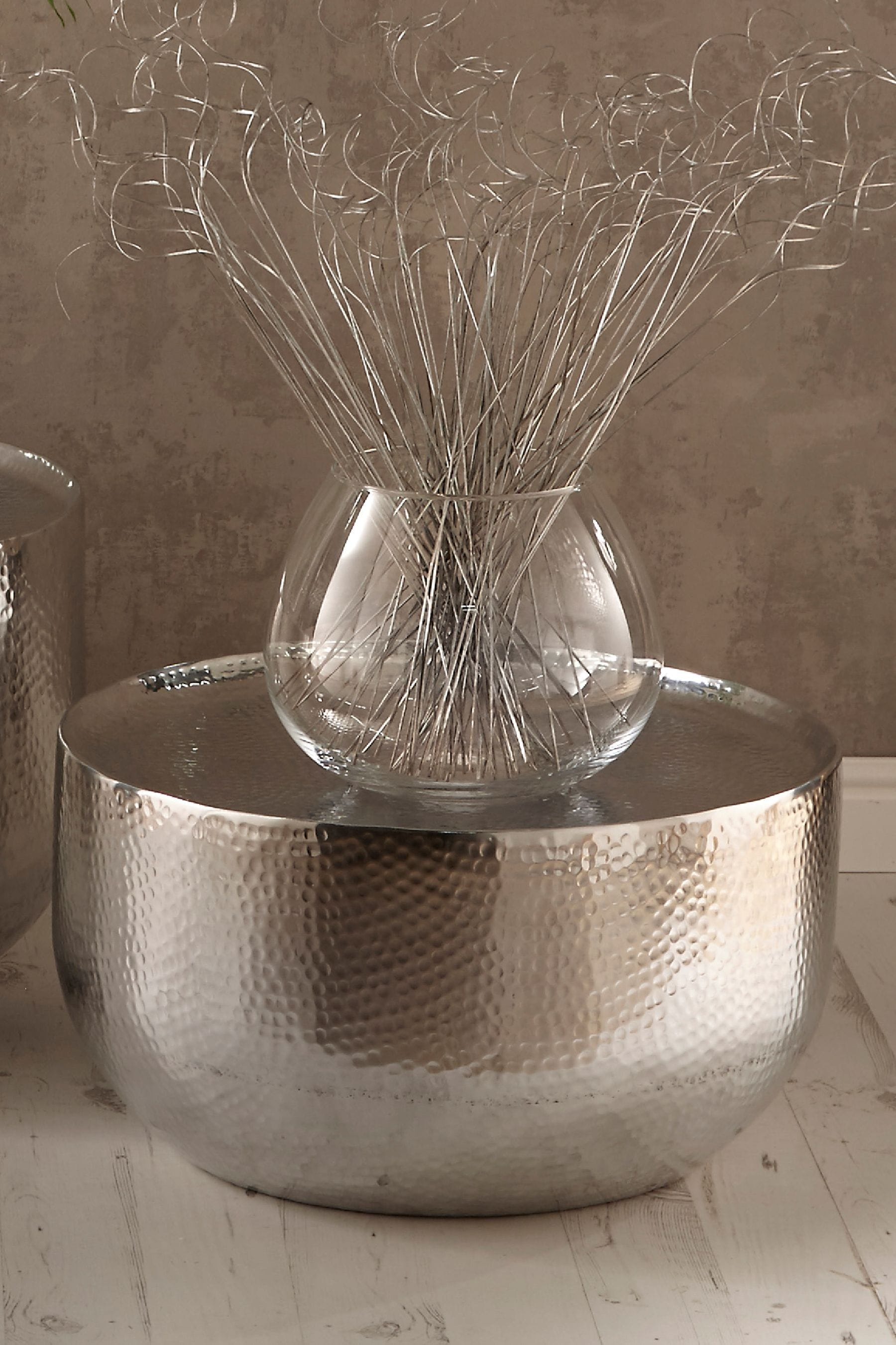 Round silver hammered coffee outlet table
