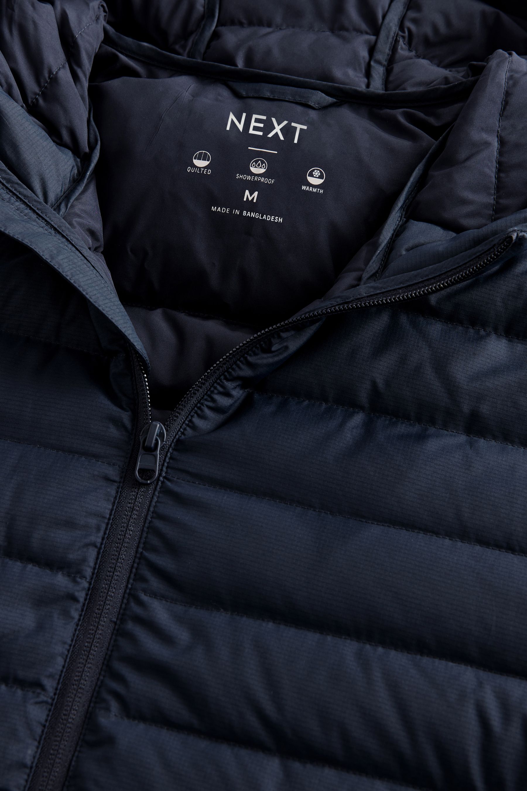 Buy Navy Blue Shower Resistant Lightweight Hooded Puffer Coat Jacket from the Next UK online shop