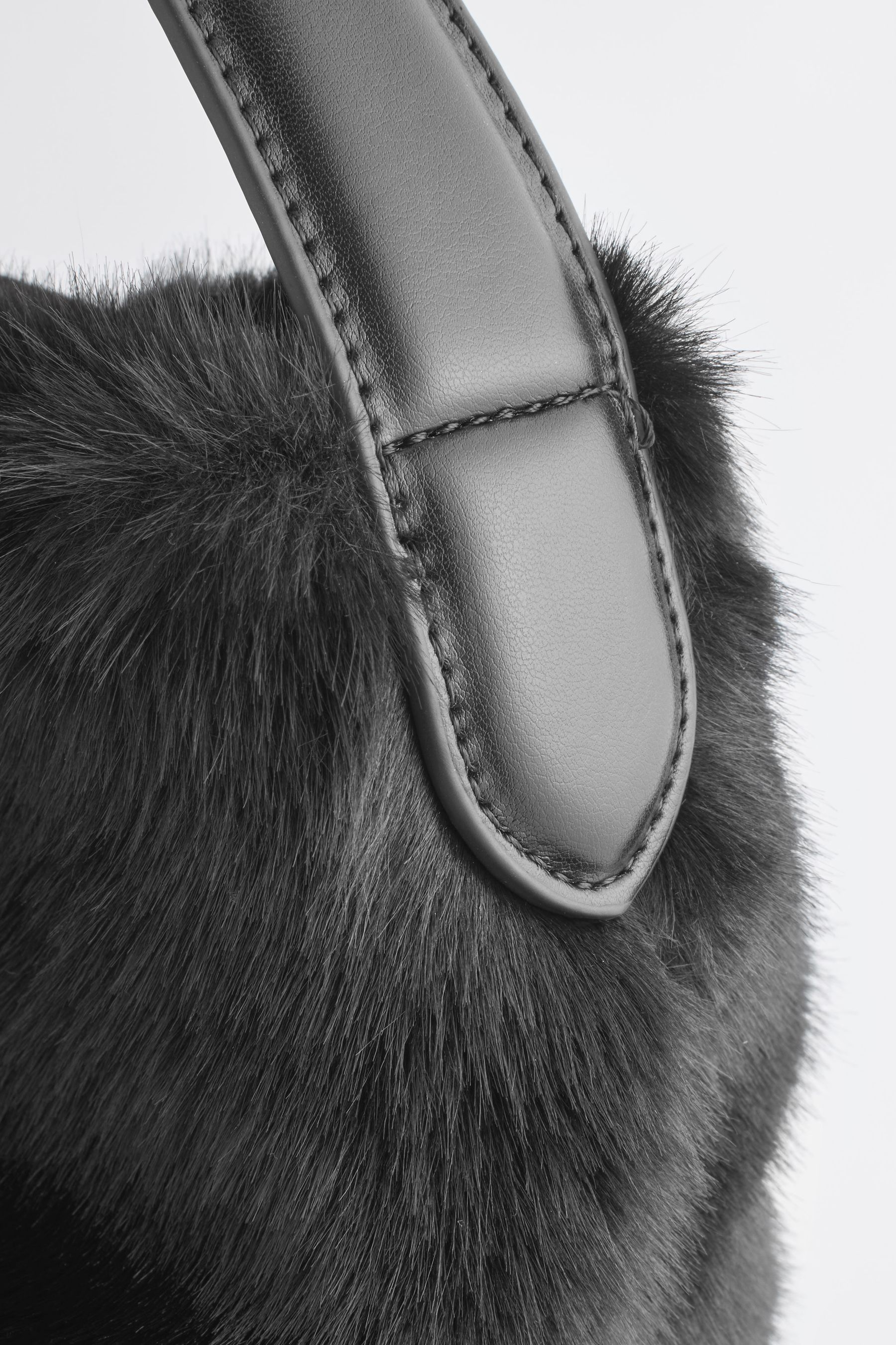 Black fur clutch store