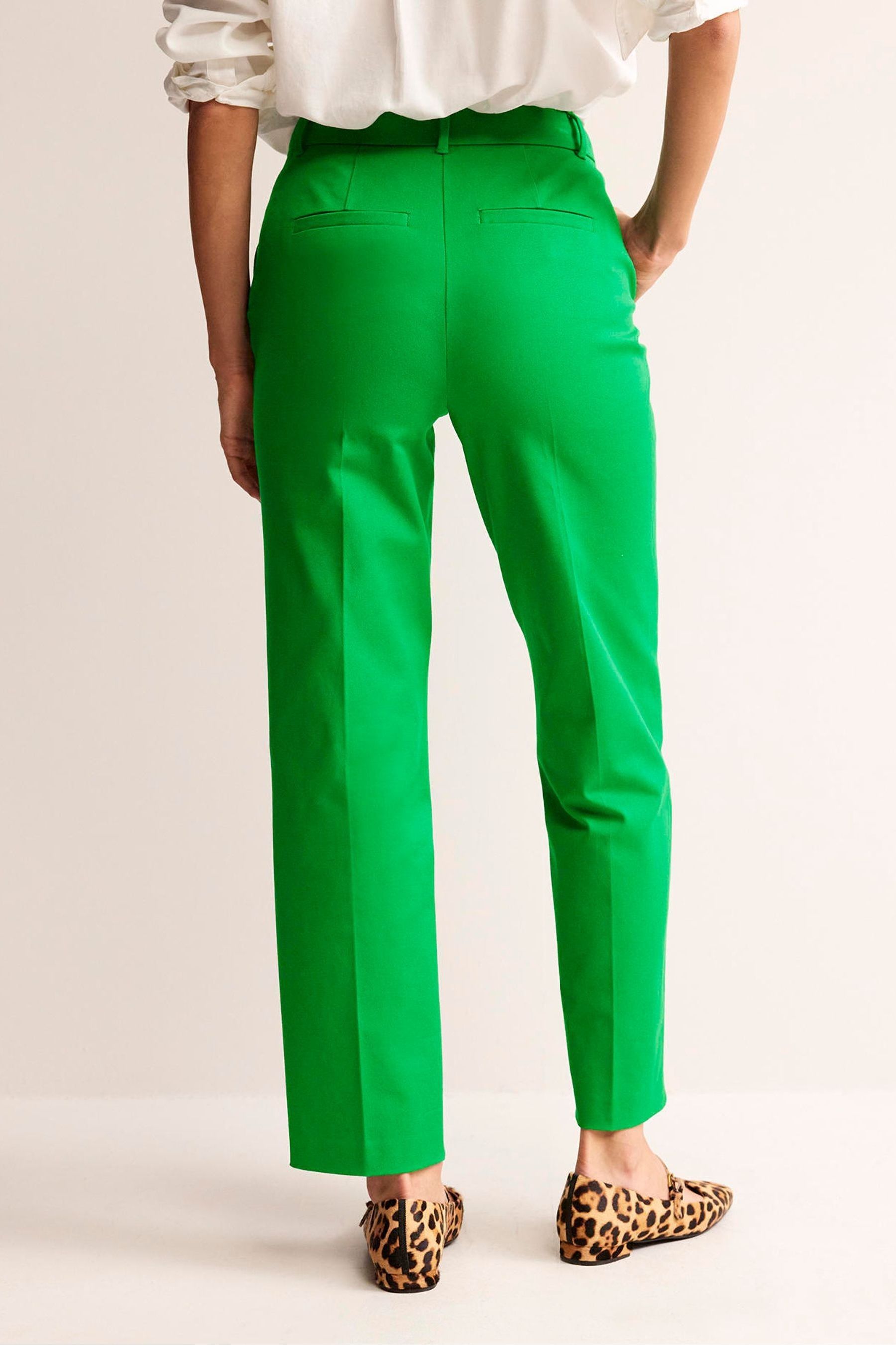 Green trousers with side stripe top