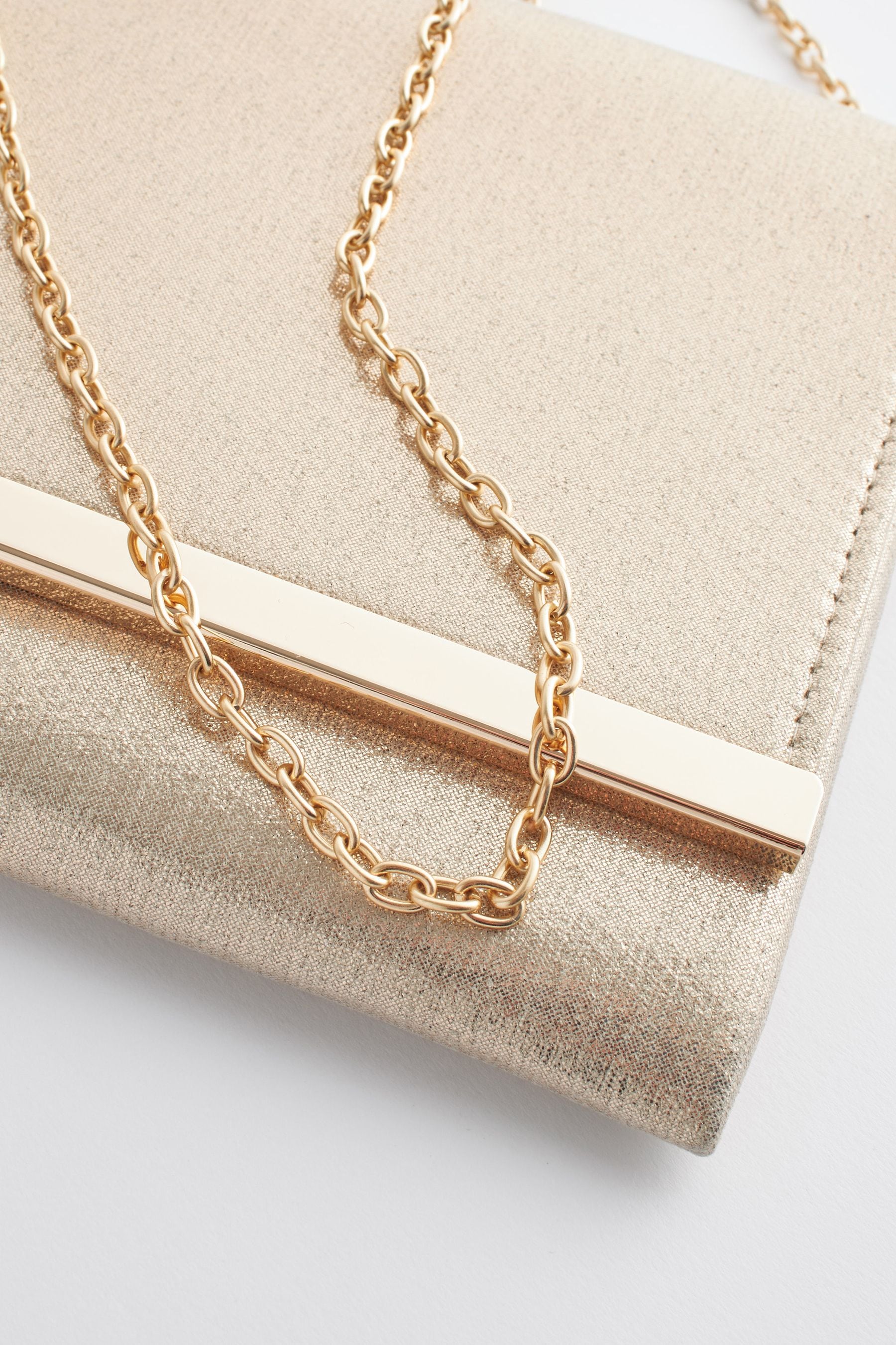 Buy Gold Clutch Bag With Detachable Cross Body Chain from Next Ireland