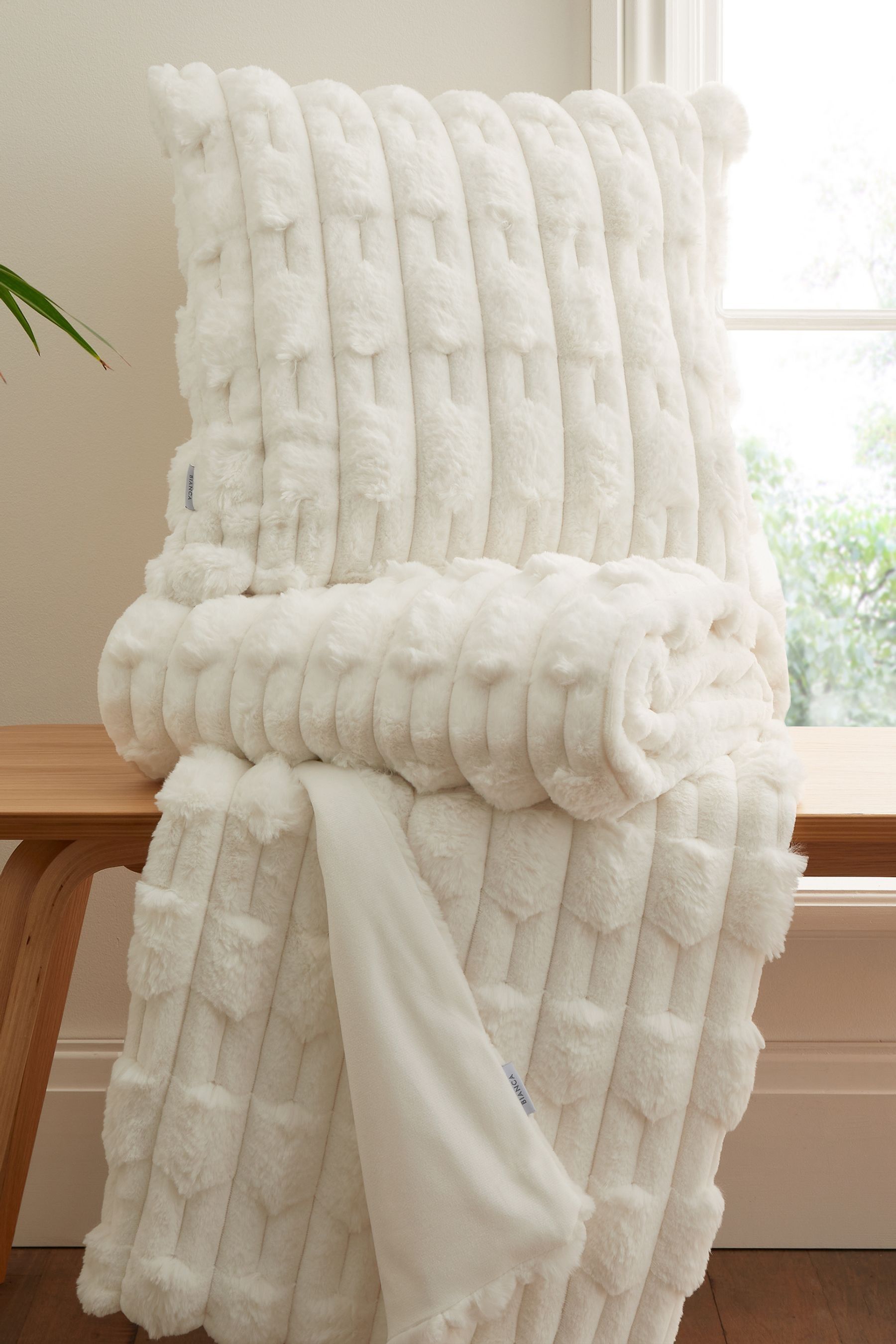 Next cream throw hot sale