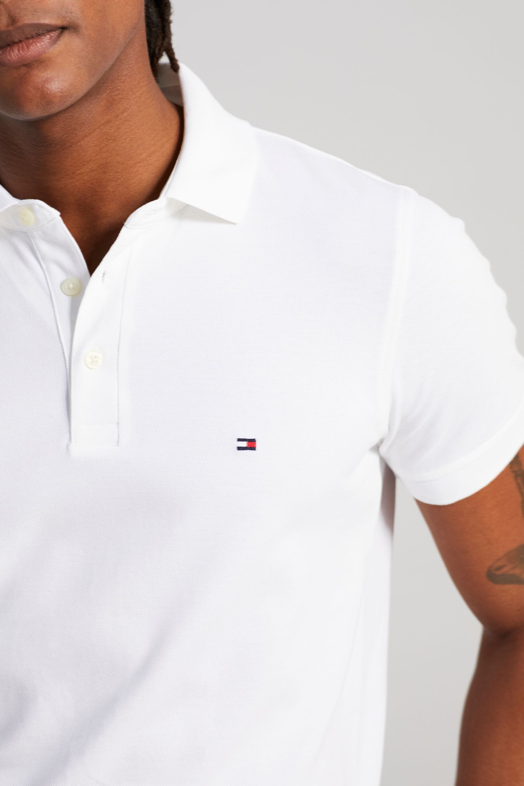 Buy Tommy Hilfiger White 1985 Slim Polo Shirt from Next Singapore