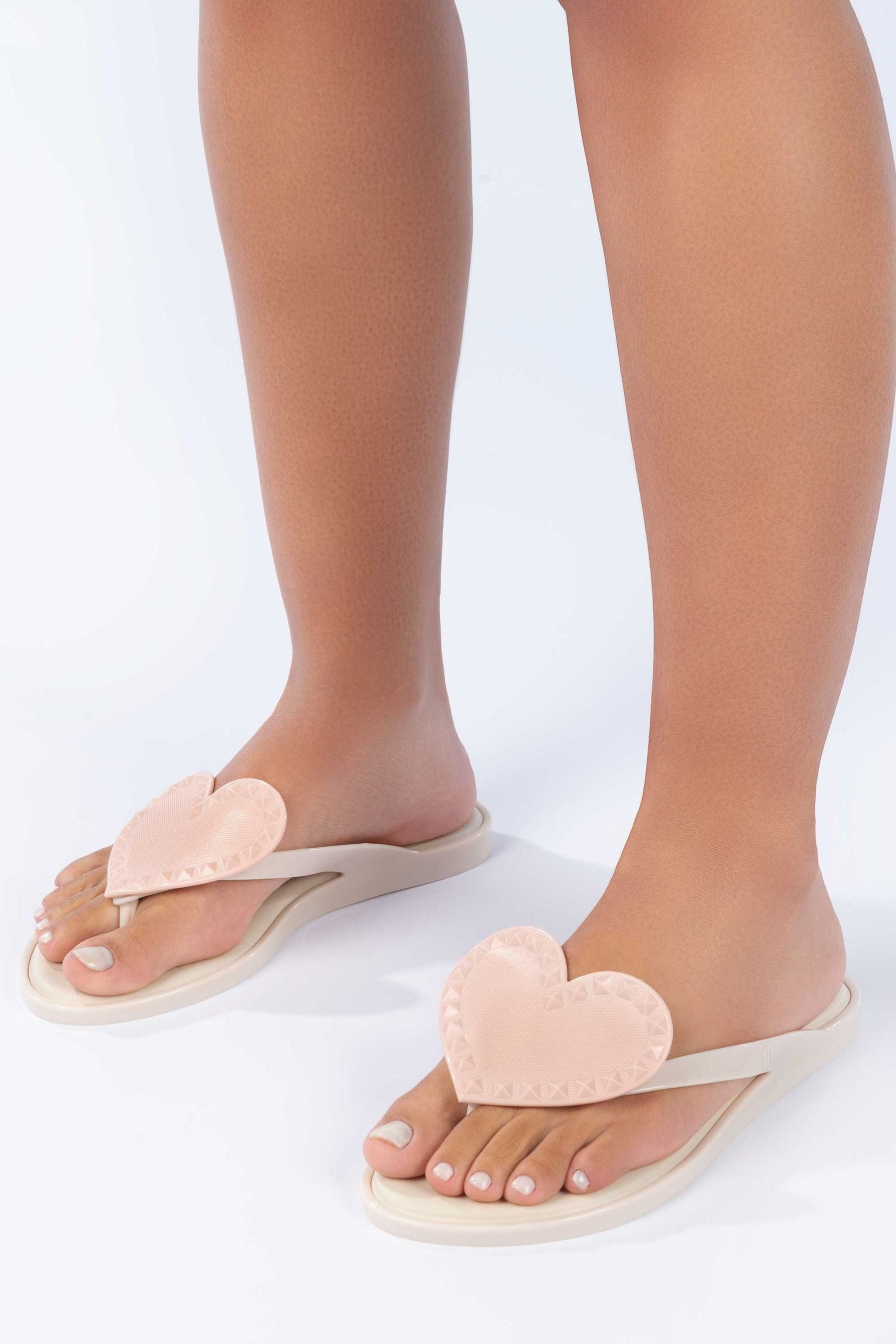 Heart flip flop sales