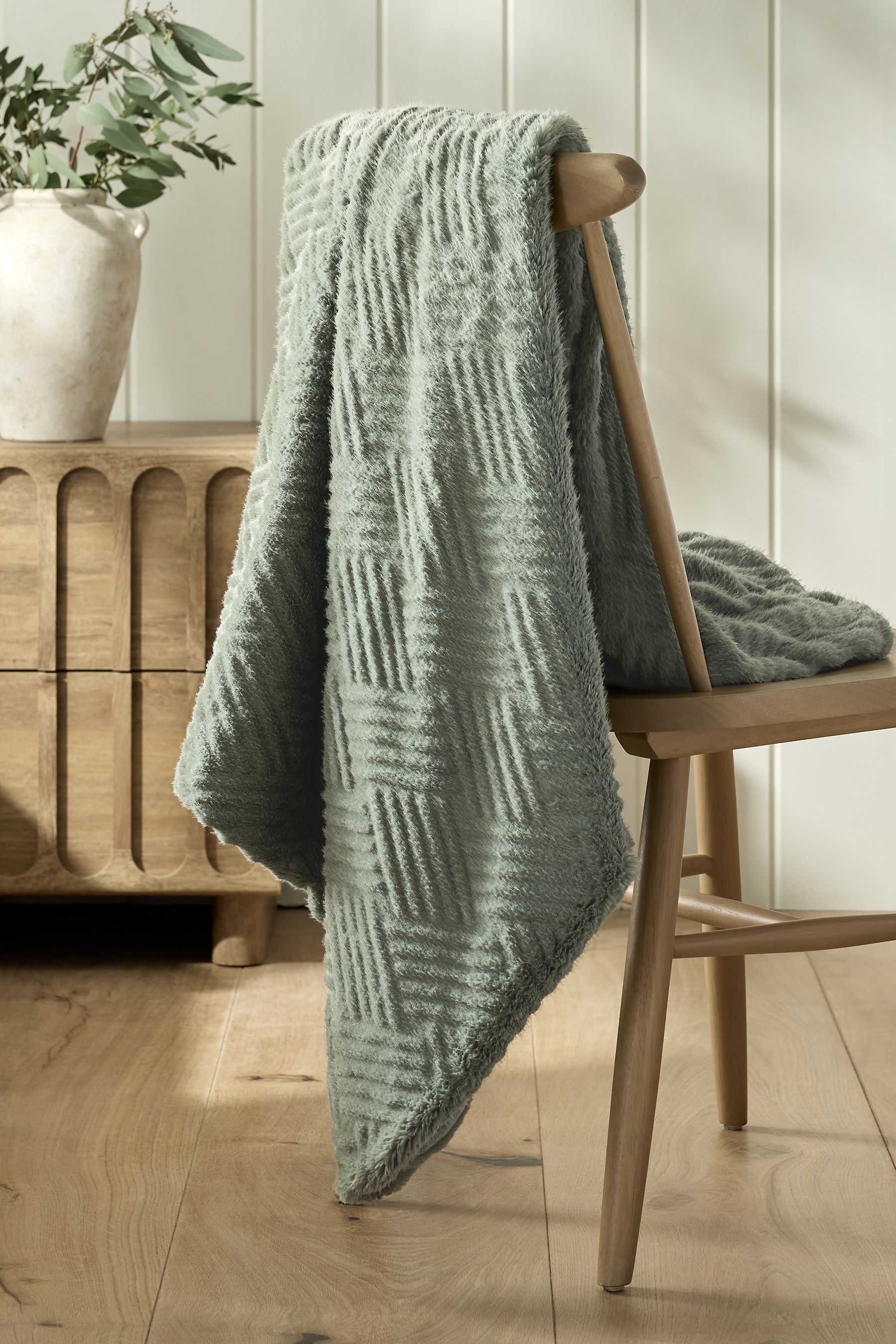 Buy Sage Green Basset Embossed Faux Fur Throw from the Next UK online shop