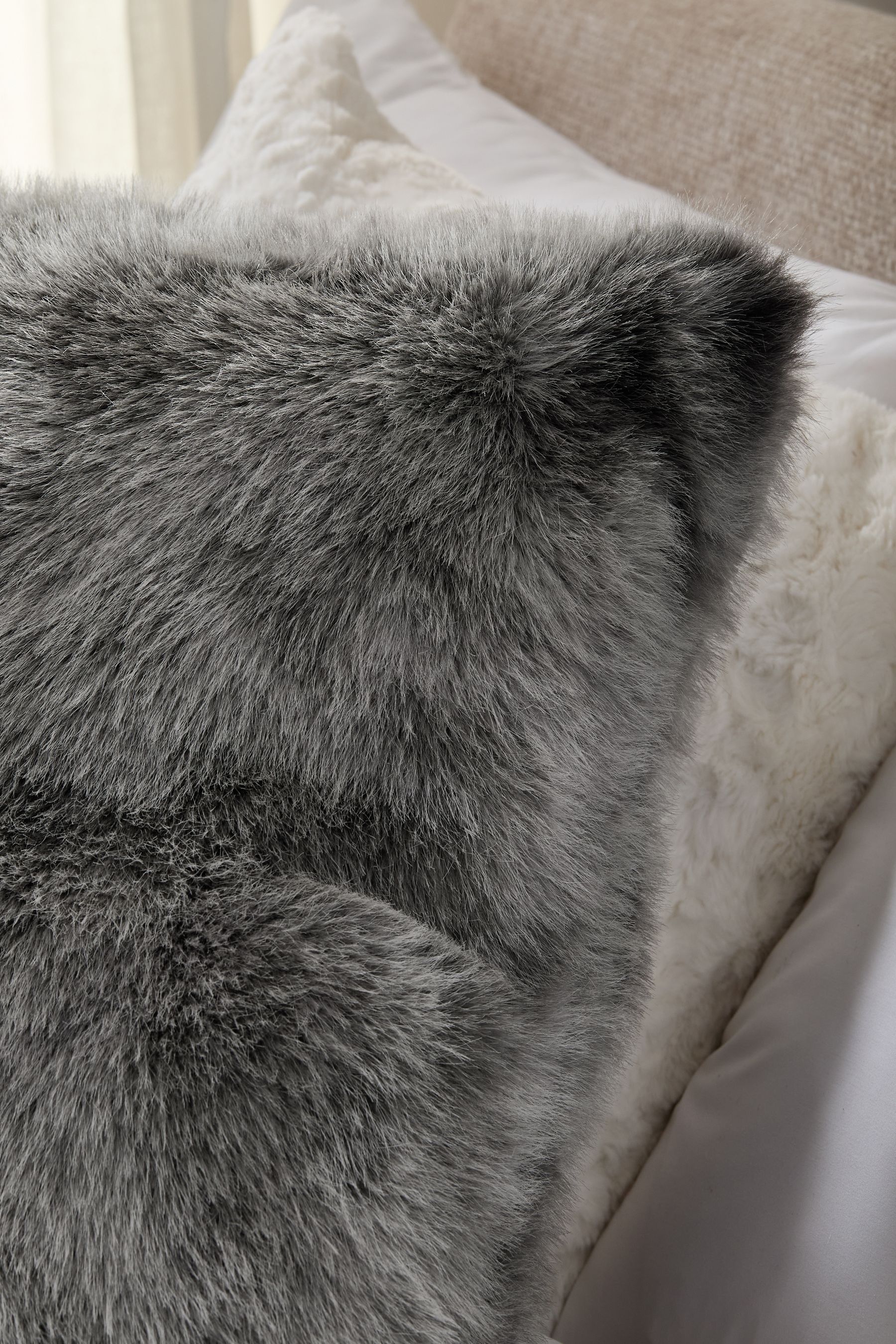 Buy Charcoal Grey 59 x 59cm Loulou Faux Fur Cushion from Next Luxembourg